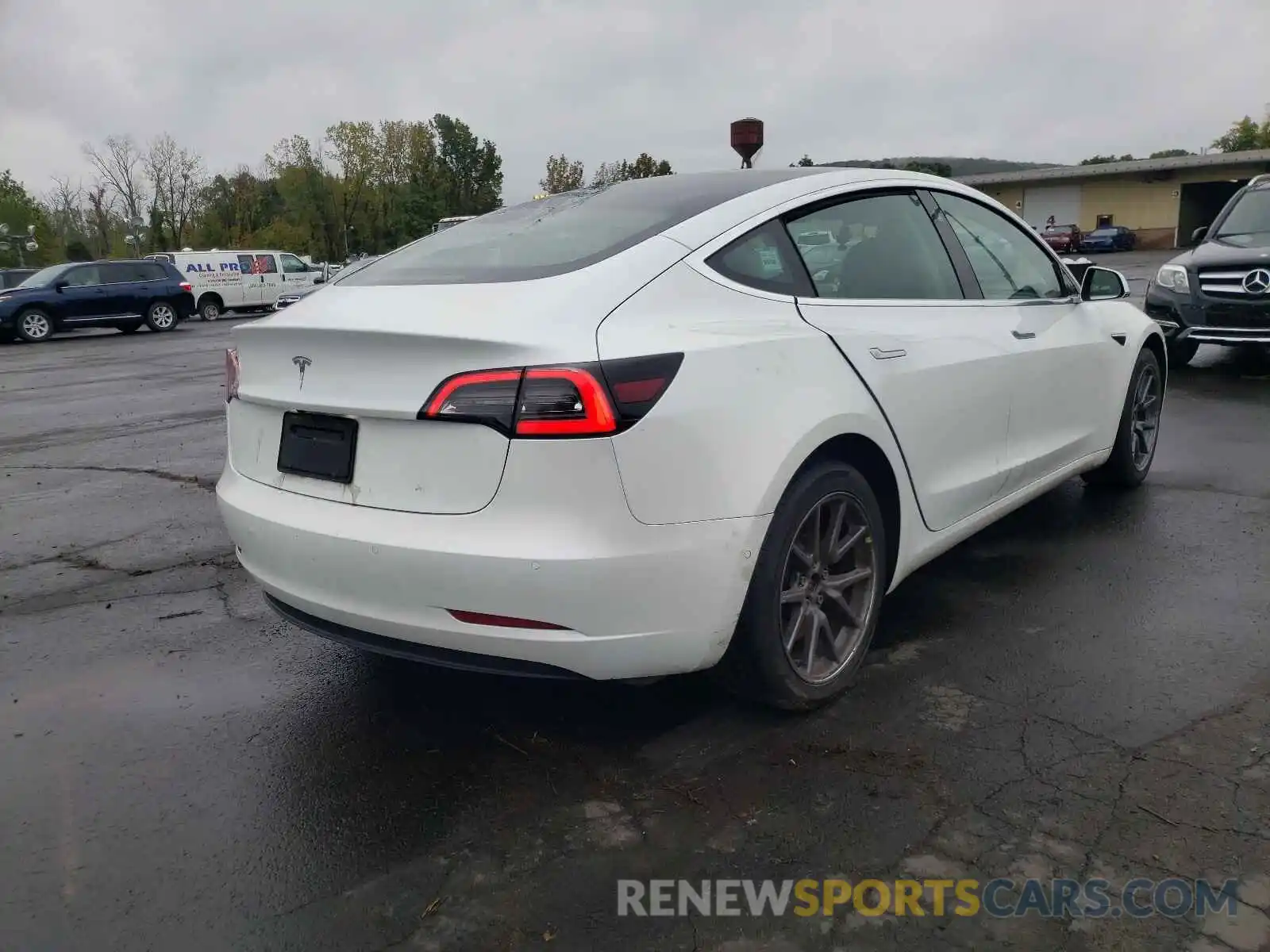 4 Photograph of a damaged car 5YJ3E1EA5LF590689 TESLA MODEL 3 2020