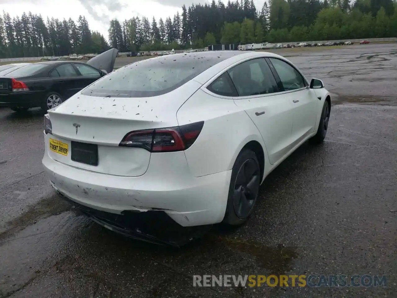 4 Photograph of a damaged car 5YJ3E1EA5LF613601 TESLA MODEL 3 2020