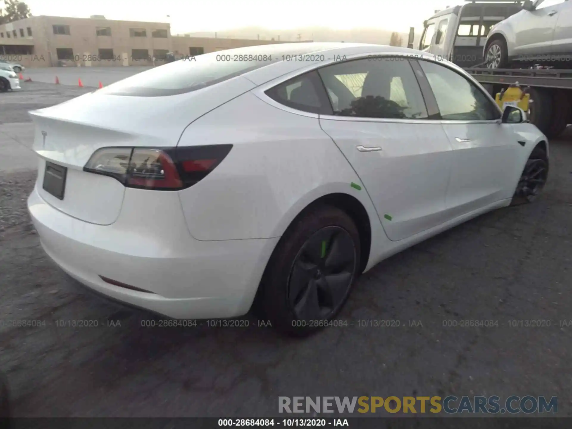 4 Photograph of a damaged car 5YJ3E1EA5LF631936 TESLA MODEL 3 2020