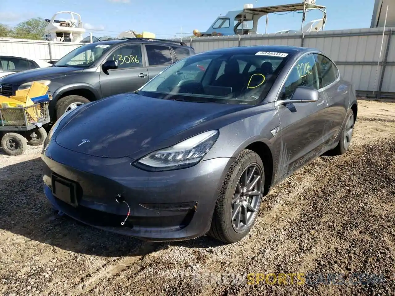 2 Photograph of a damaged car 5YJ3E1EA5LF703170 TESLA MODEL 3 2020