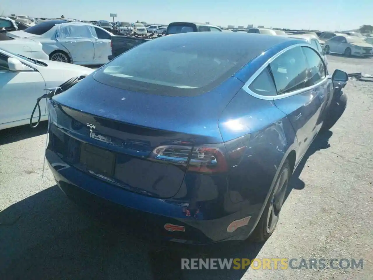 4 Photograph of a damaged car 5YJ3E1EA5LF706005 TESLA MODEL 3 2020