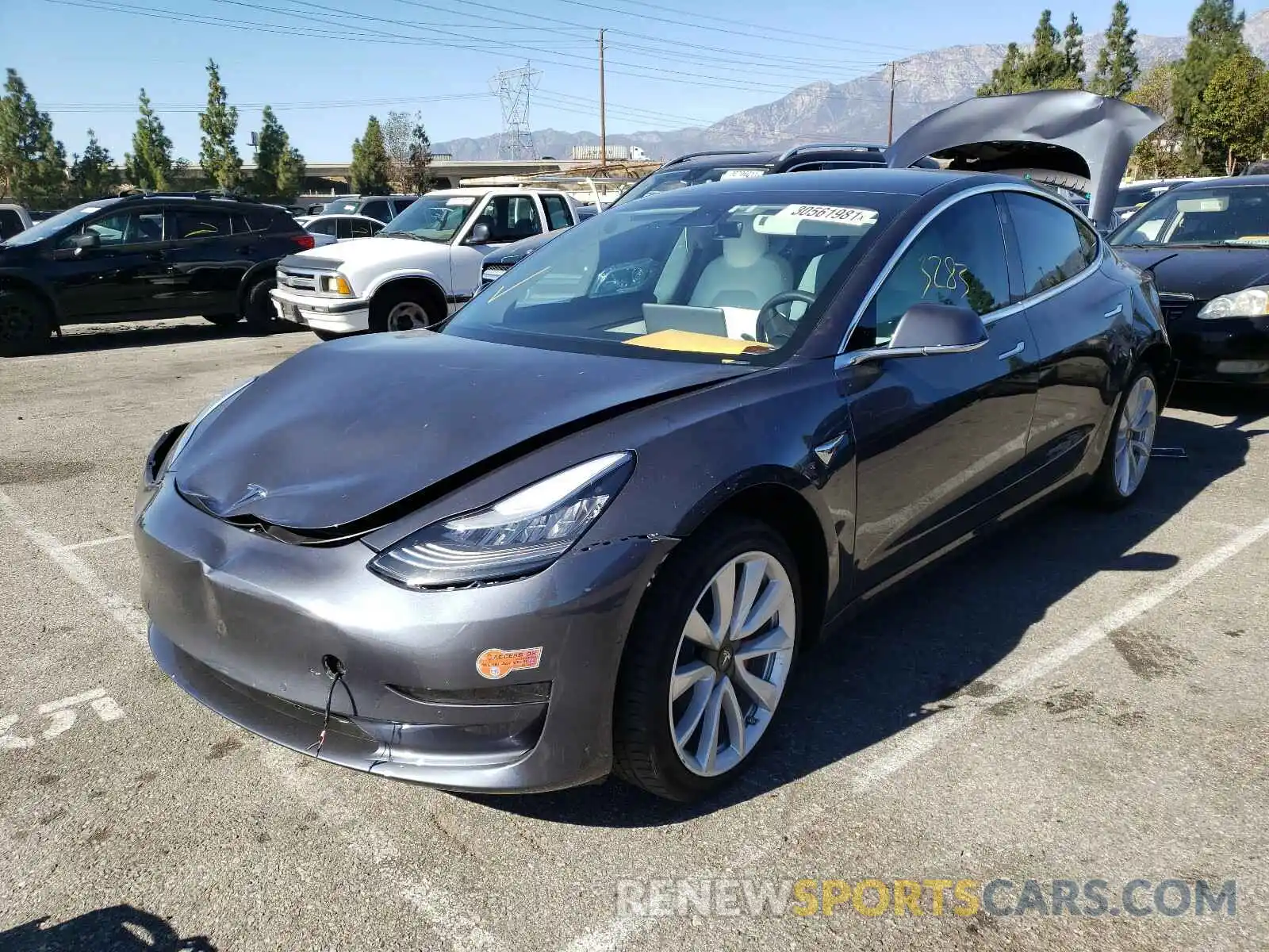 2 Photograph of a damaged car 5YJ3E1EA5LF717649 TESLA MODEL 3 2020