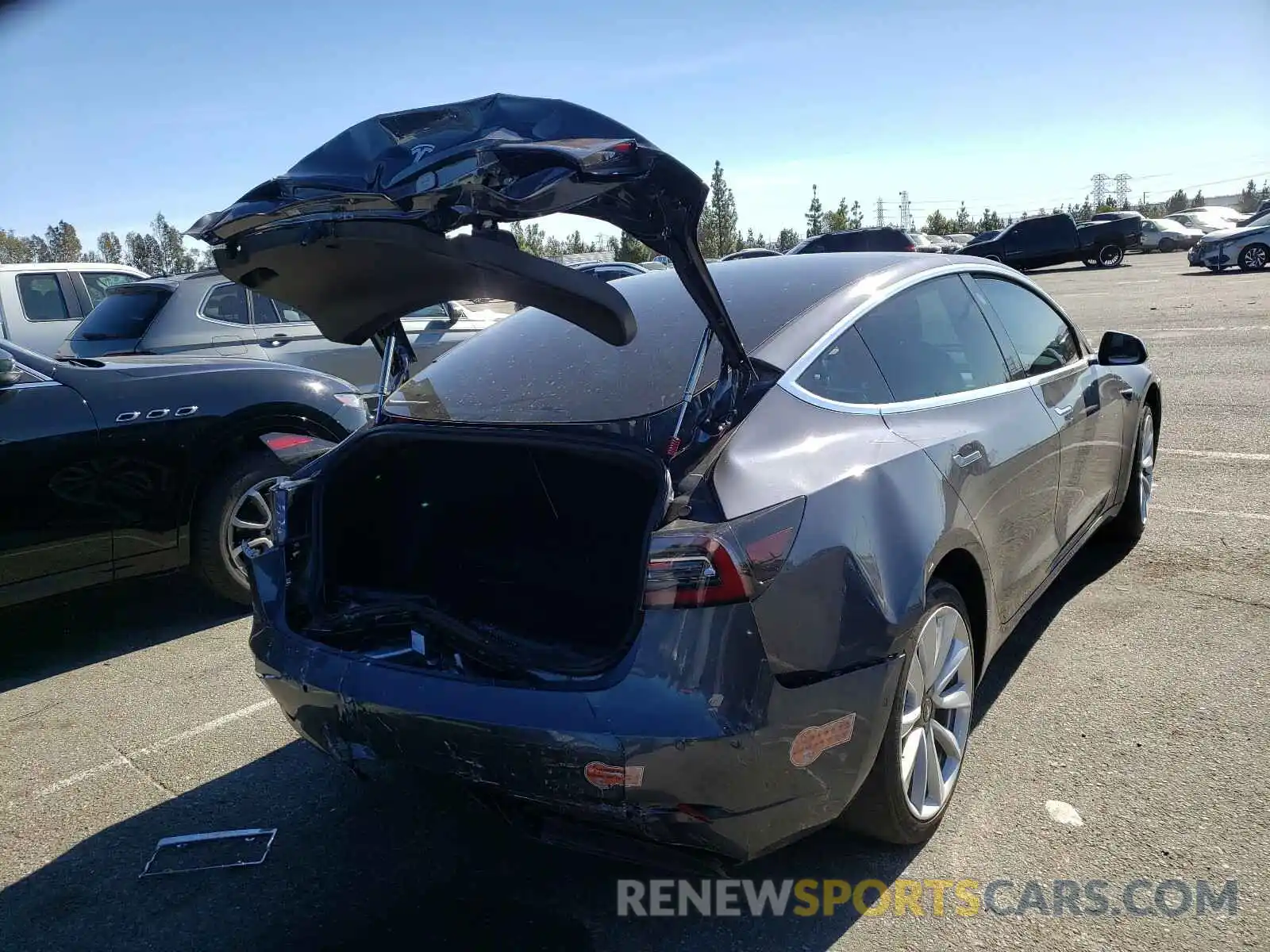 4 Photograph of a damaged car 5YJ3E1EA5LF717649 TESLA MODEL 3 2020