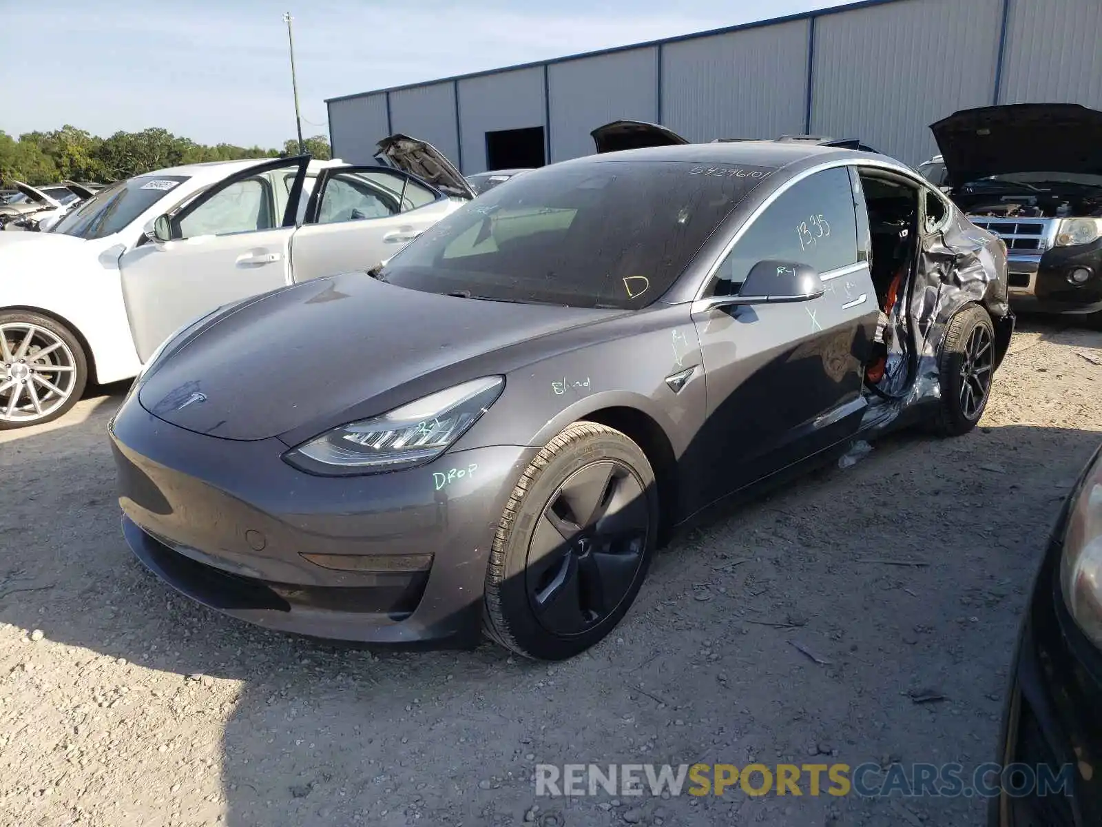 2 Photograph of a damaged car 5YJ3E1EA5LF736637 TESLA MODEL 3 2020