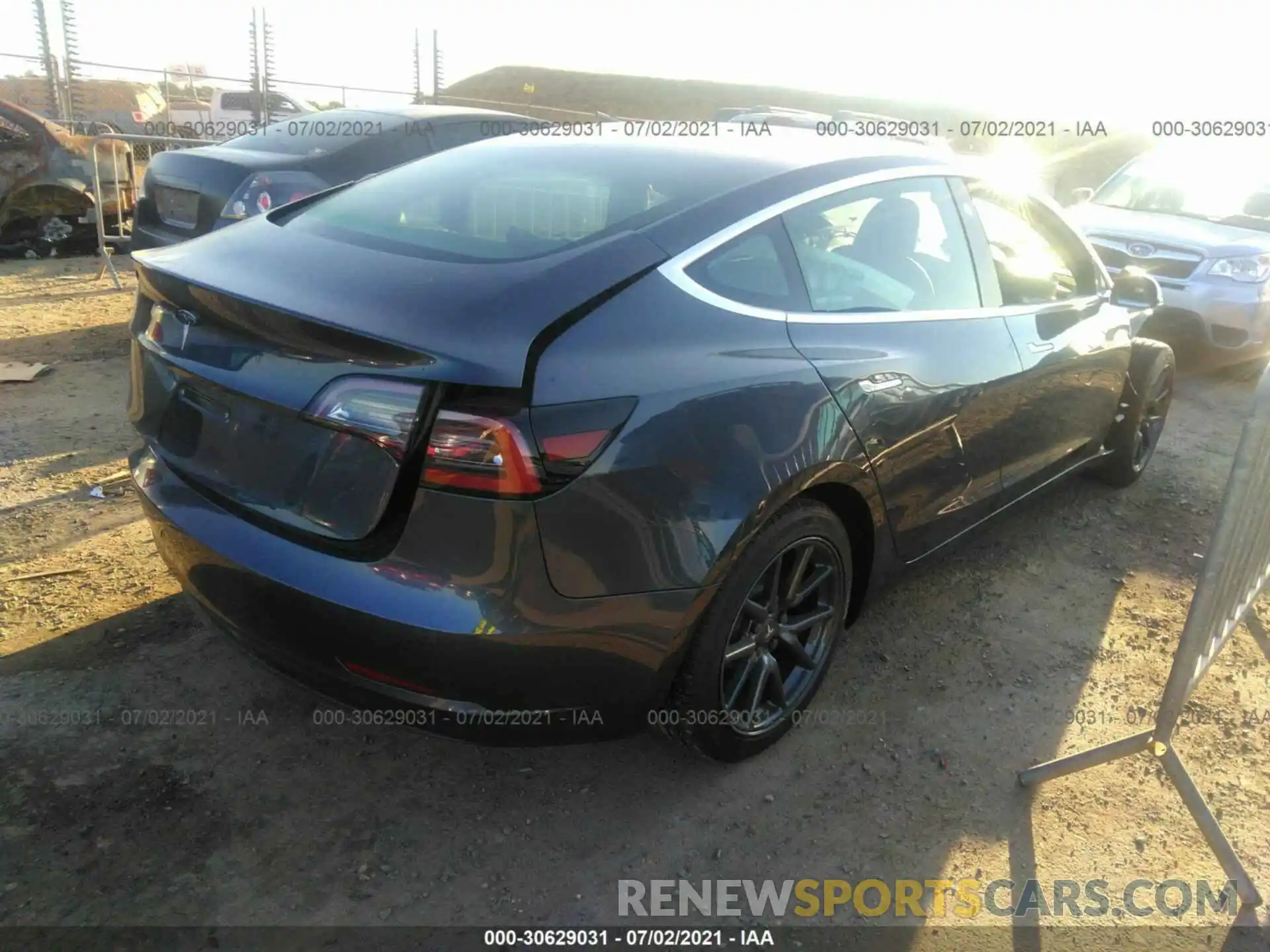 4 Photograph of a damaged car 5YJ3E1EA5LF739392 TESLA MODEL 3 2020