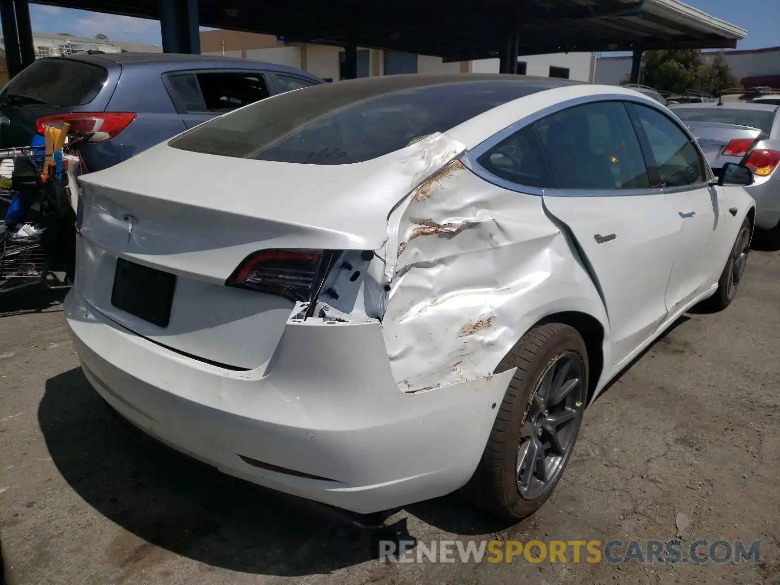 4 Photograph of a damaged car 5YJ3E1EA5LF745192 TESLA MODEL 3 2020