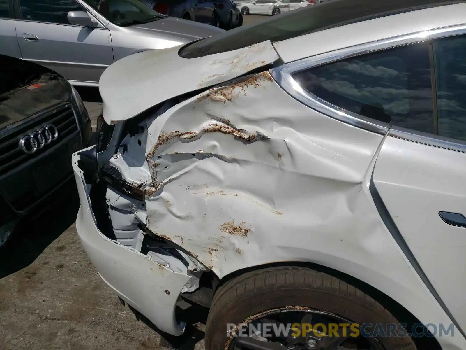 9 Photograph of a damaged car 5YJ3E1EA5LF745192 TESLA MODEL 3 2020