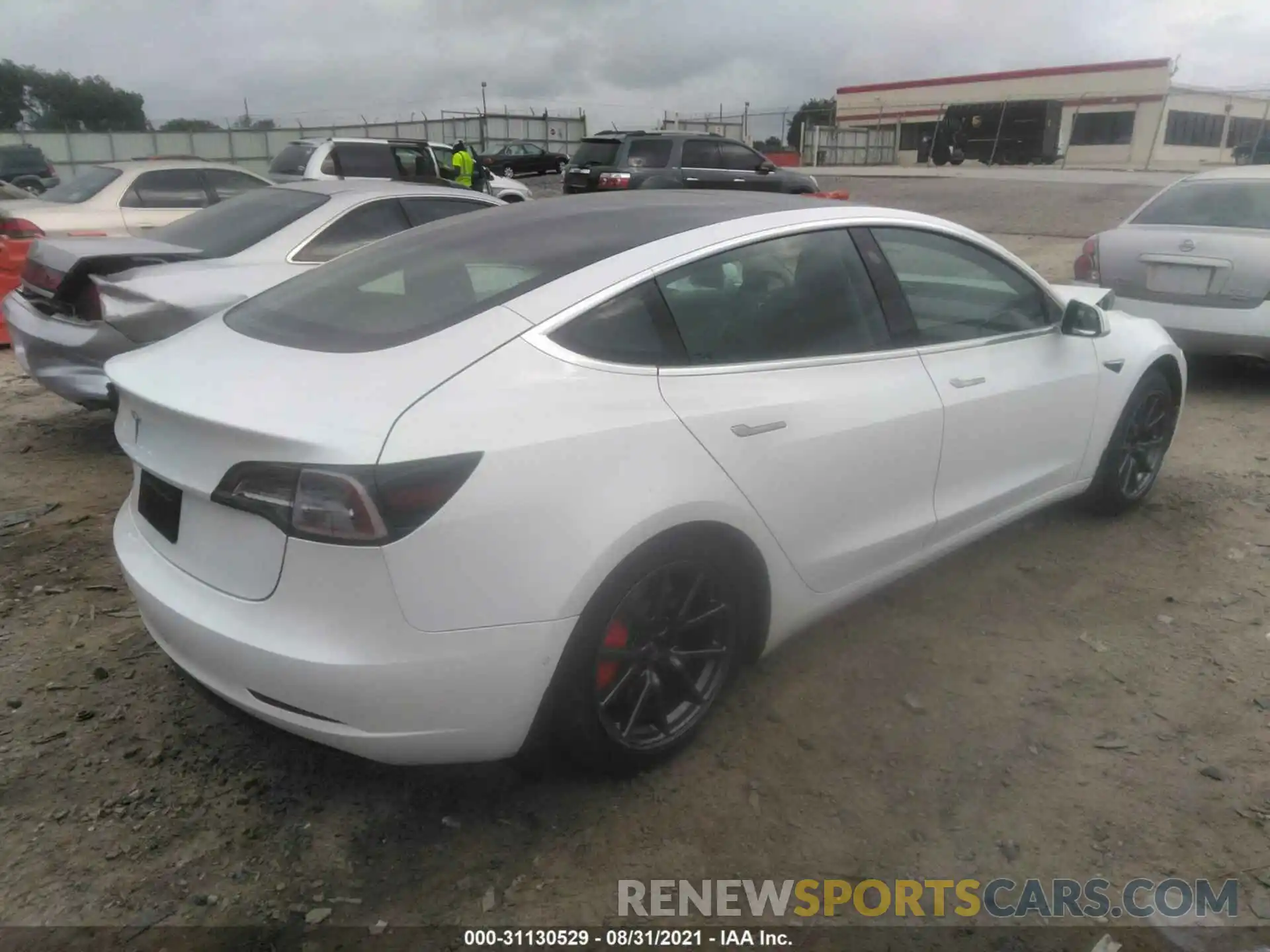 4 Photograph of a damaged car 5YJ3E1EA5LF785160 TESLA MODEL 3 2020