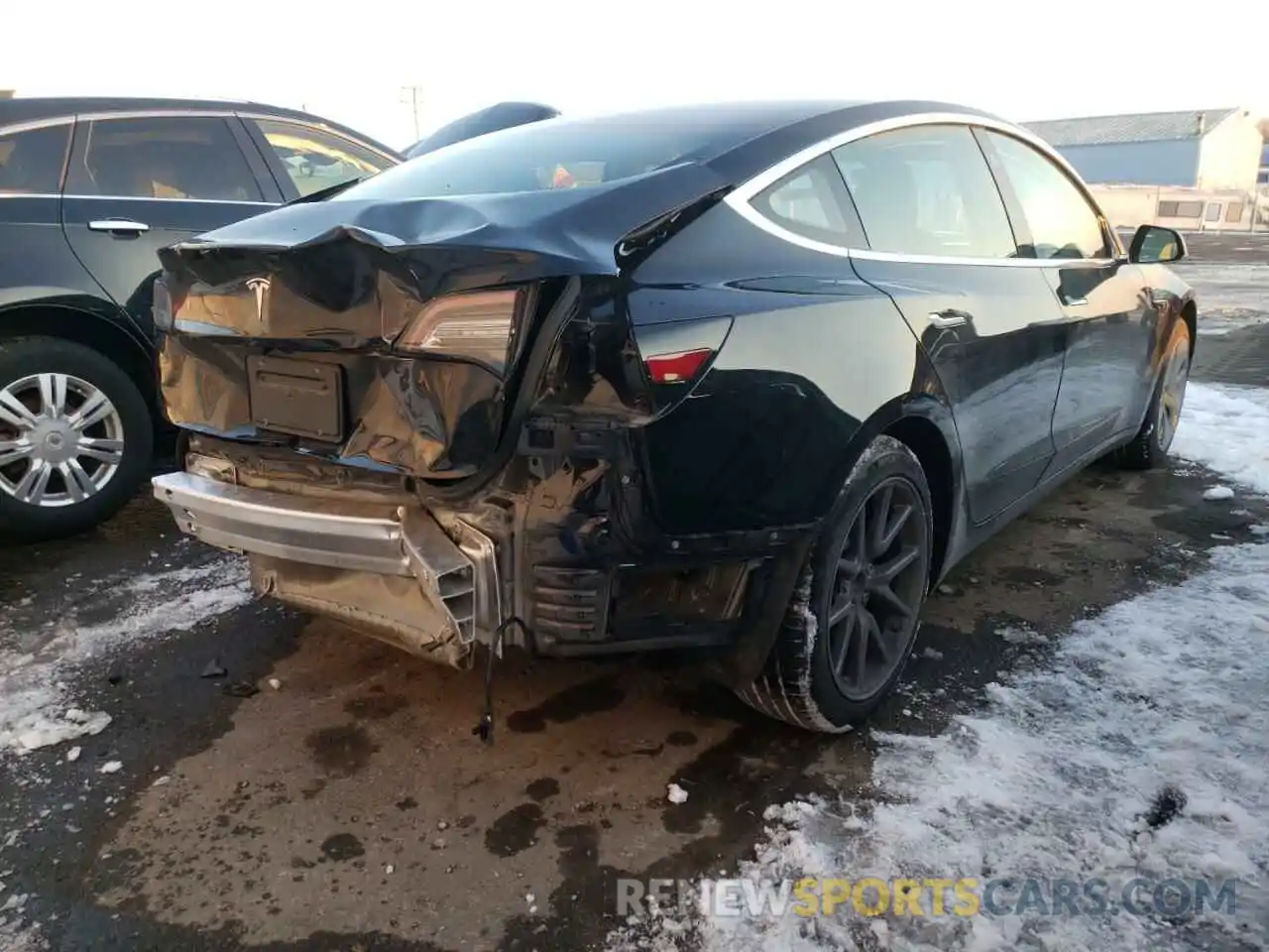 4 Photograph of a damaged car 5YJ3E1EA5LF792125 TESLA MODEL 3 2020