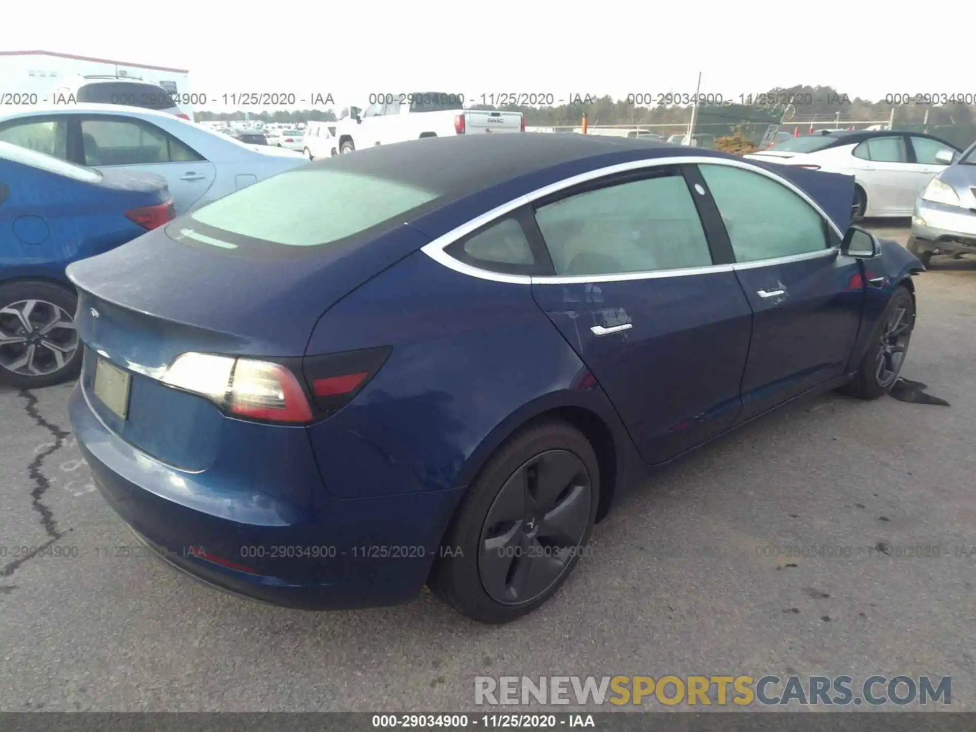 4 Photograph of a damaged car 5YJ3E1EA5LF797695 TESLA MODEL 3 2020