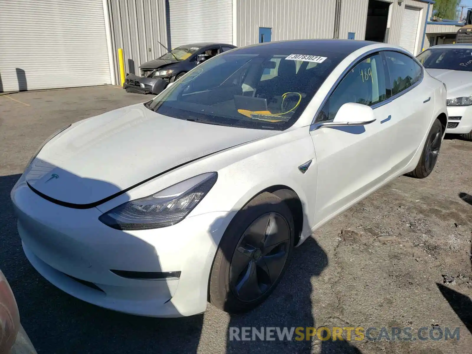 2 Photograph of a damaged car 5YJ3E1EA5LF799463 TESLA MODEL 3 2020