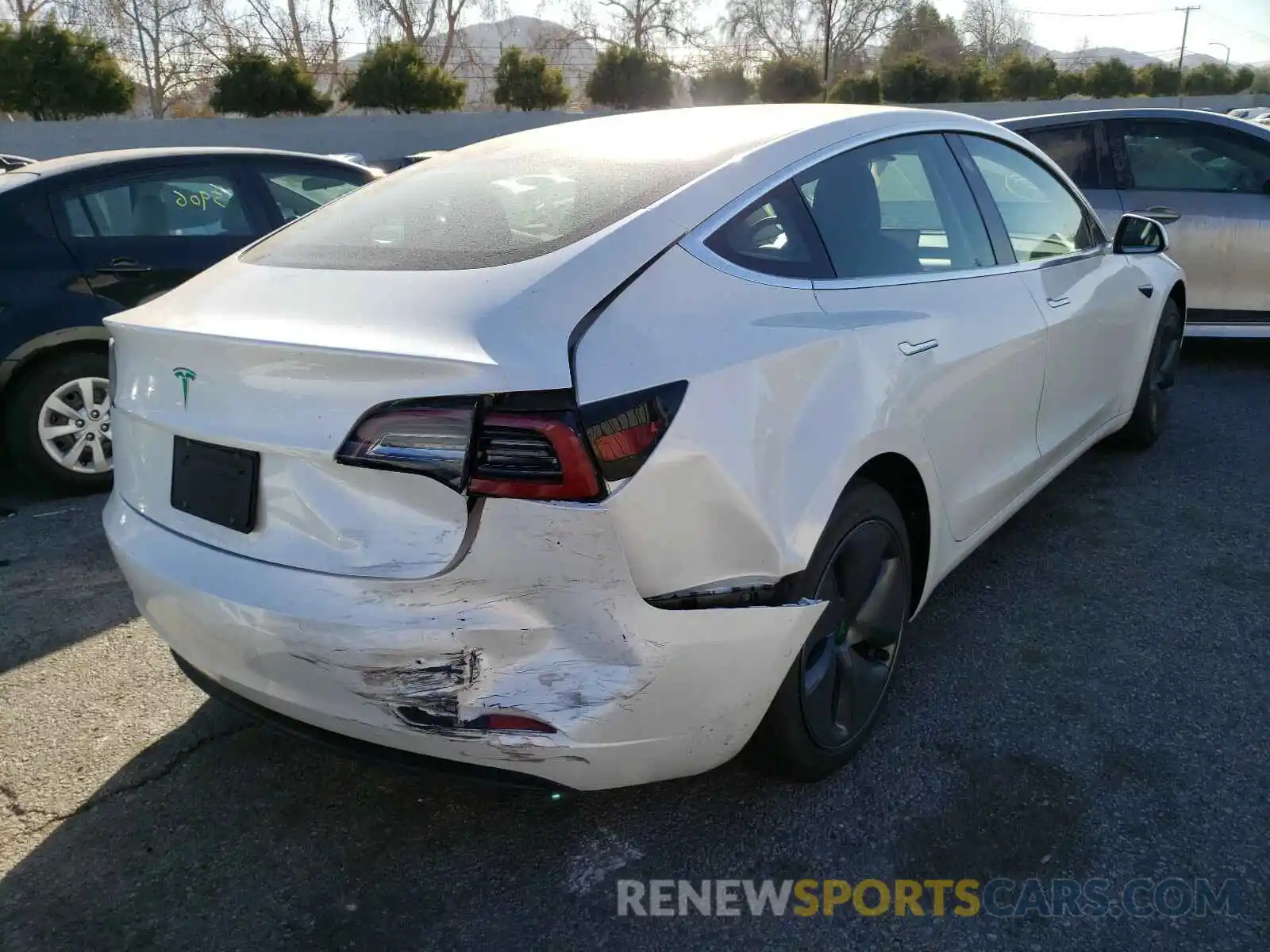 4 Photograph of a damaged car 5YJ3E1EA5LF799463 TESLA MODEL 3 2020