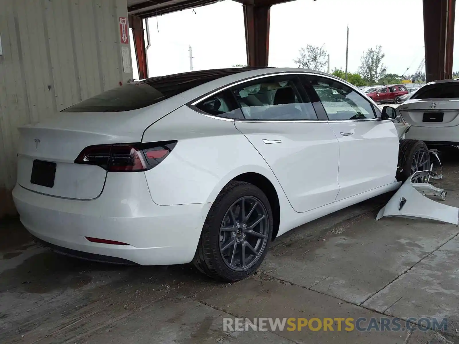 4 Photograph of a damaged car 5YJ3E1EA6LF504628 TESLA MODEL 3 2020