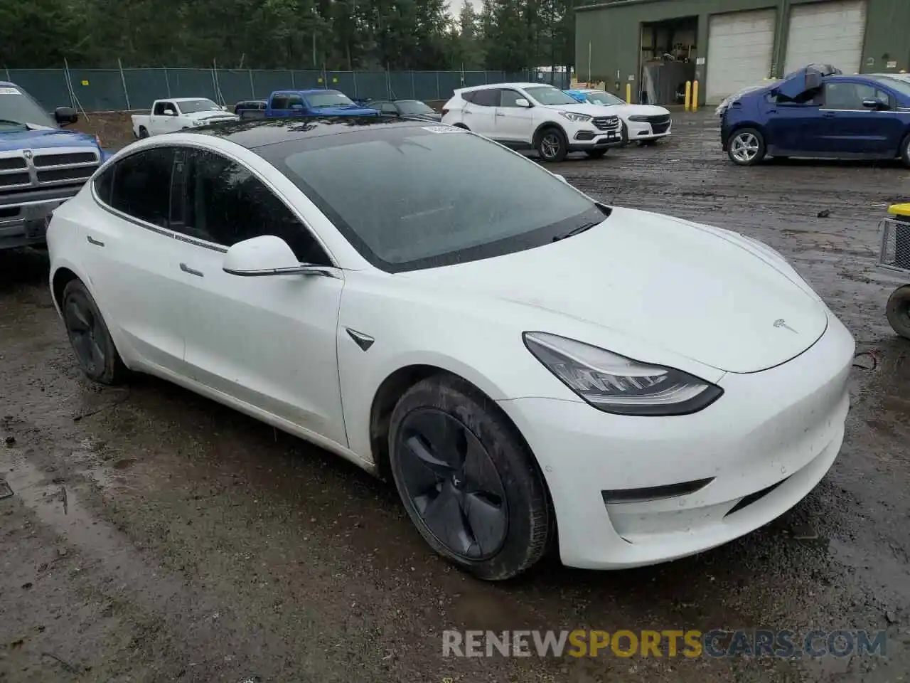 4 Photograph of a damaged car 5YJ3E1EA6LF504659 TESLA MODEL 3 2020