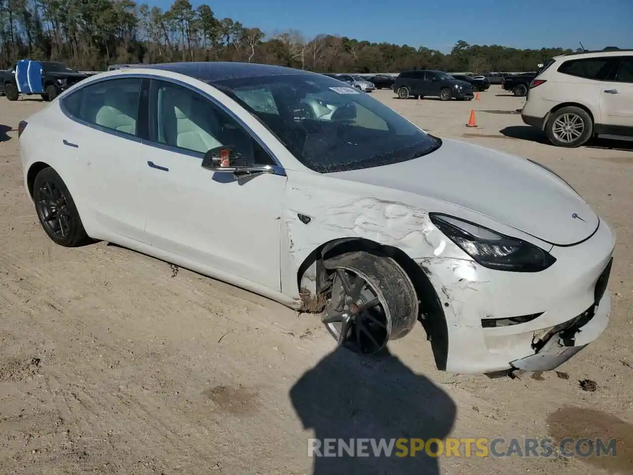 4 Photograph of a damaged car 5YJ3E1EA6LF509599 TESLA MODEL 3 2020