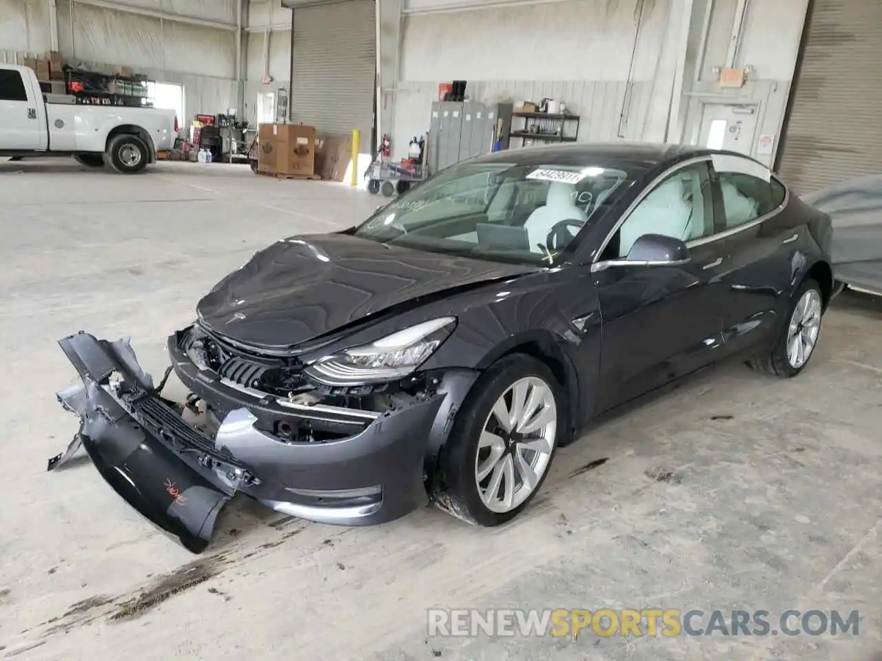 2 Photograph of a damaged car 5YJ3E1EA6LF509893 TESLA MODEL 3 2020