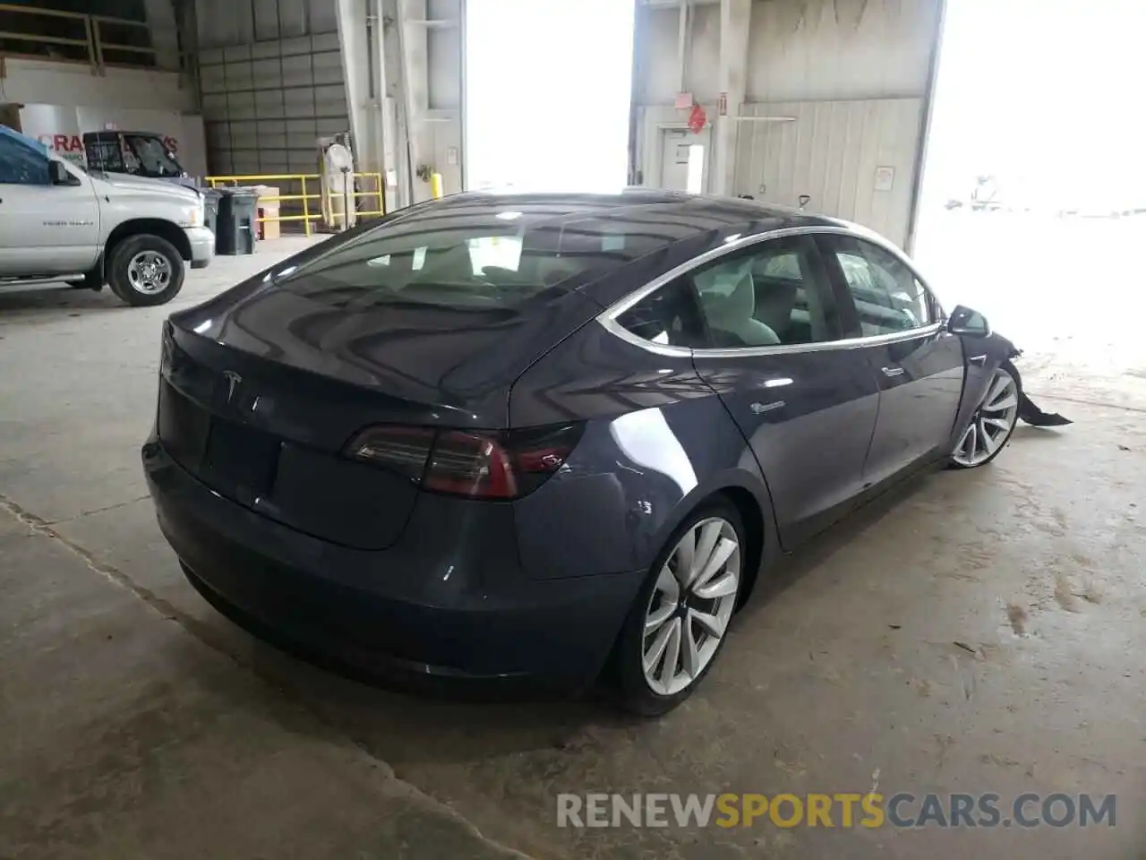 4 Photograph of a damaged car 5YJ3E1EA6LF509893 TESLA MODEL 3 2020