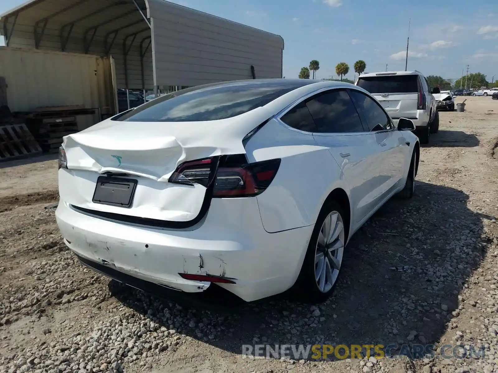 4 Photograph of a damaged car 5YJ3E1EA6LF590927 TESLA MODEL 3 2020