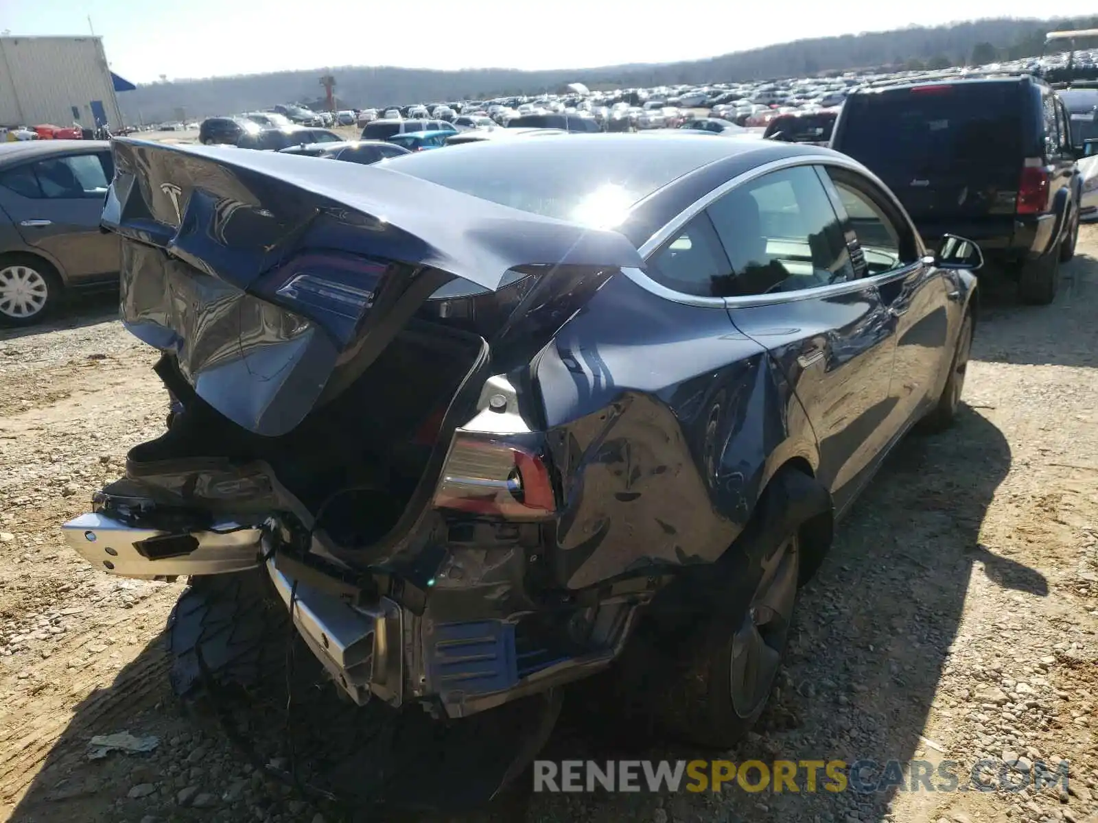 4 Photograph of a damaged car 5YJ3E1EA6LF596971 TESLA MODEL 3 2020