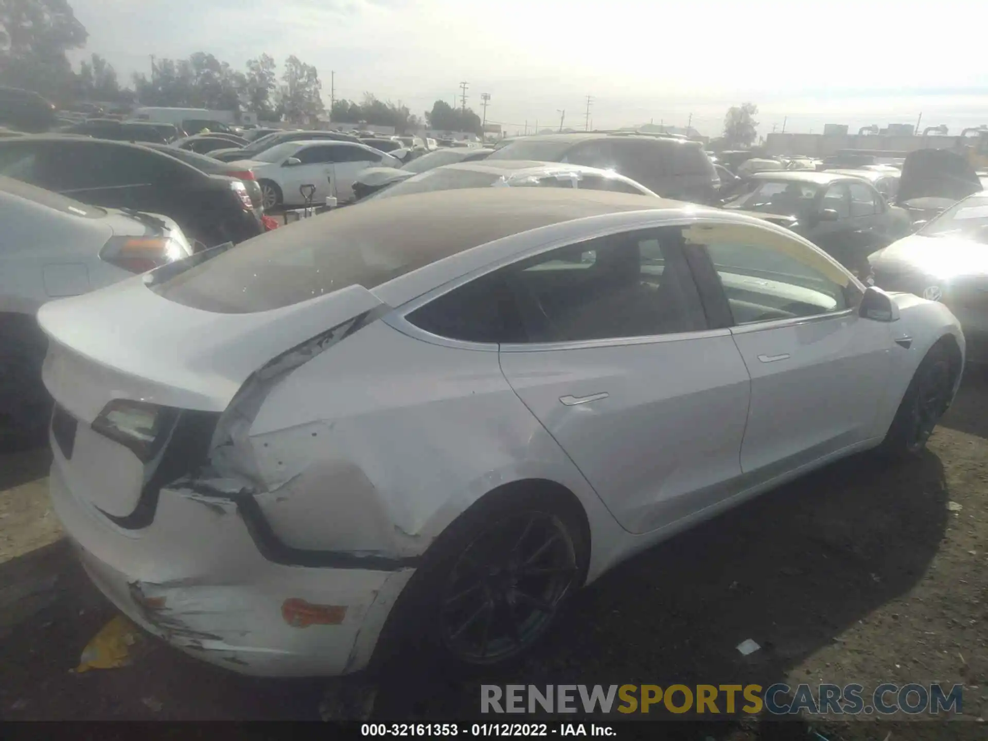 4 Photograph of a damaged car 5YJ3E1EA6LF613784 TESLA MODEL 3 2020