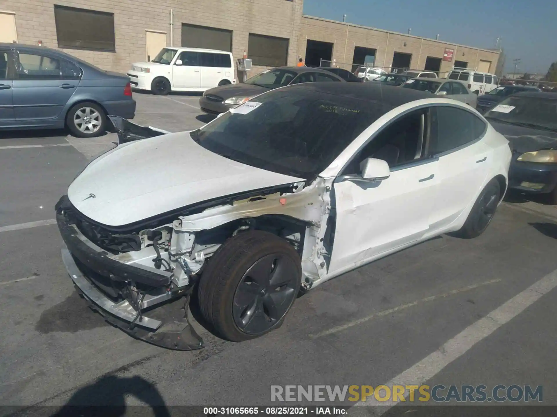 2 Photograph of a damaged car 5YJ3E1EA6LF632593 TESLA MODEL 3 2020