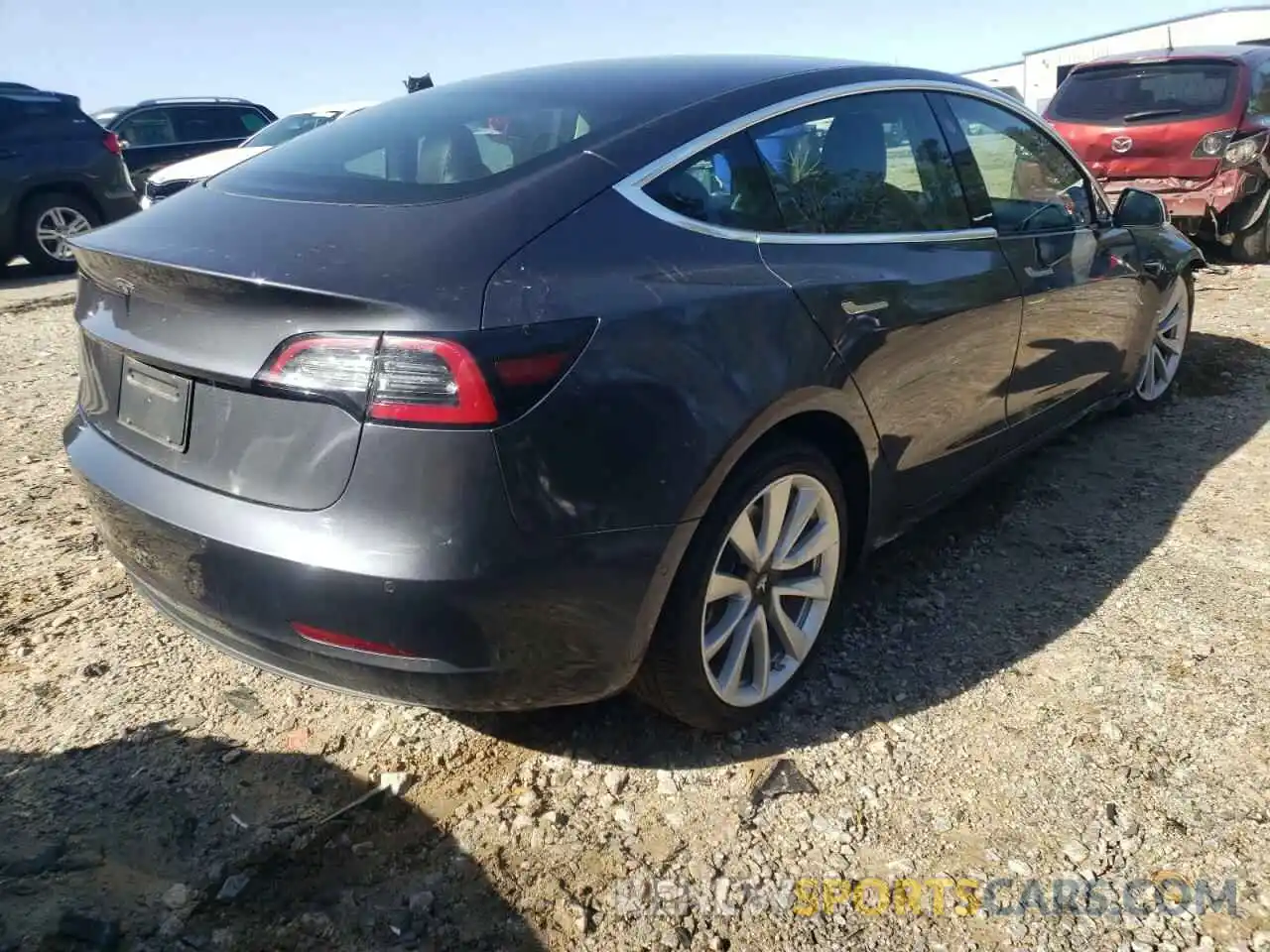 4 Photograph of a damaged car 5YJ3E1EA6LF645702 TESLA MODEL 3 2020