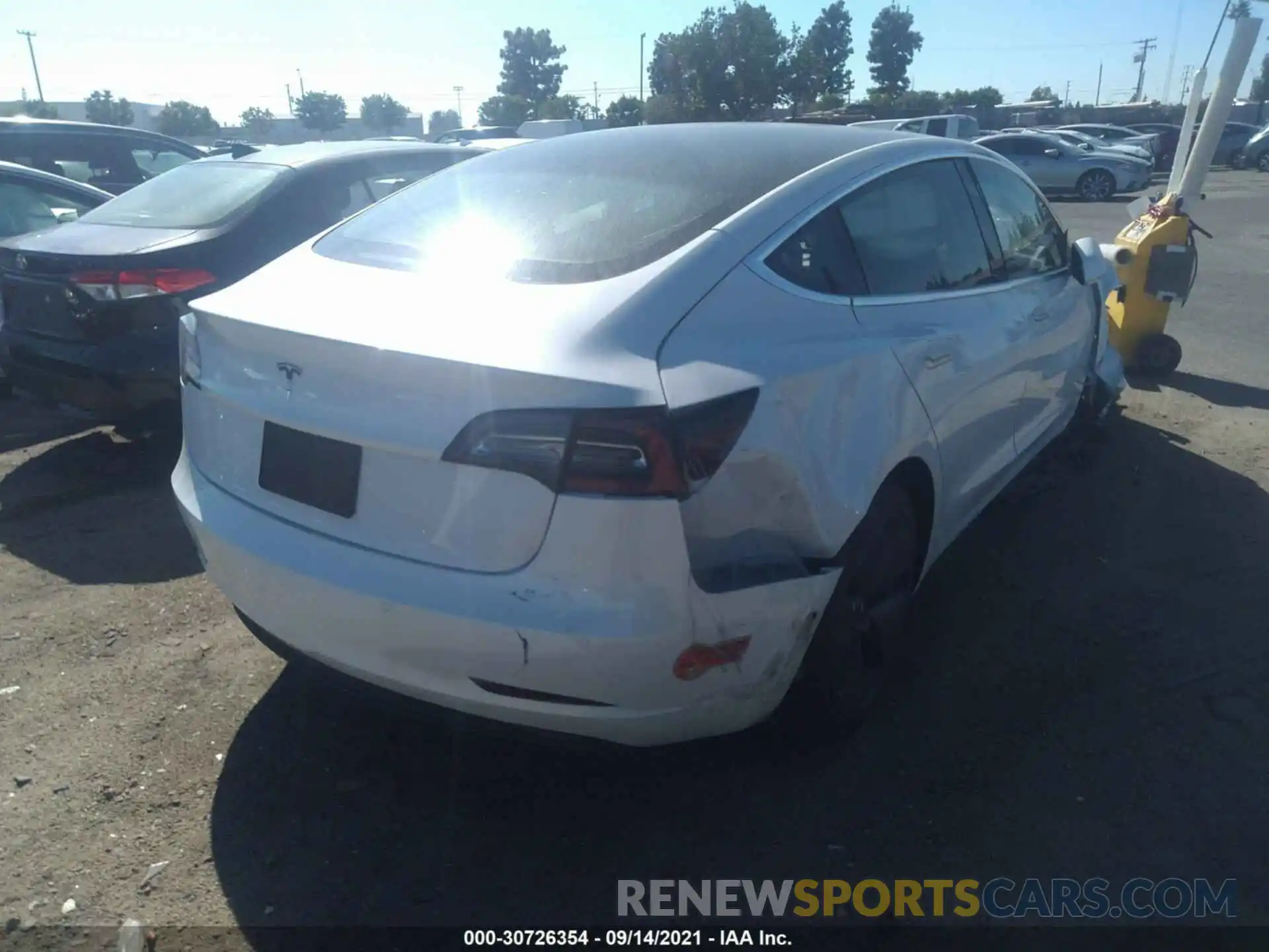 4 Photograph of a damaged car 5YJ3E1EA6LF670020 TESLA MODEL 3 2020