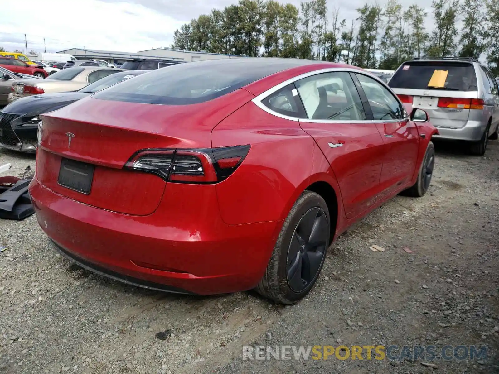 4 Photograph of a damaged car 5YJ3E1EA6LF718731 TESLA MODEL 3 2020