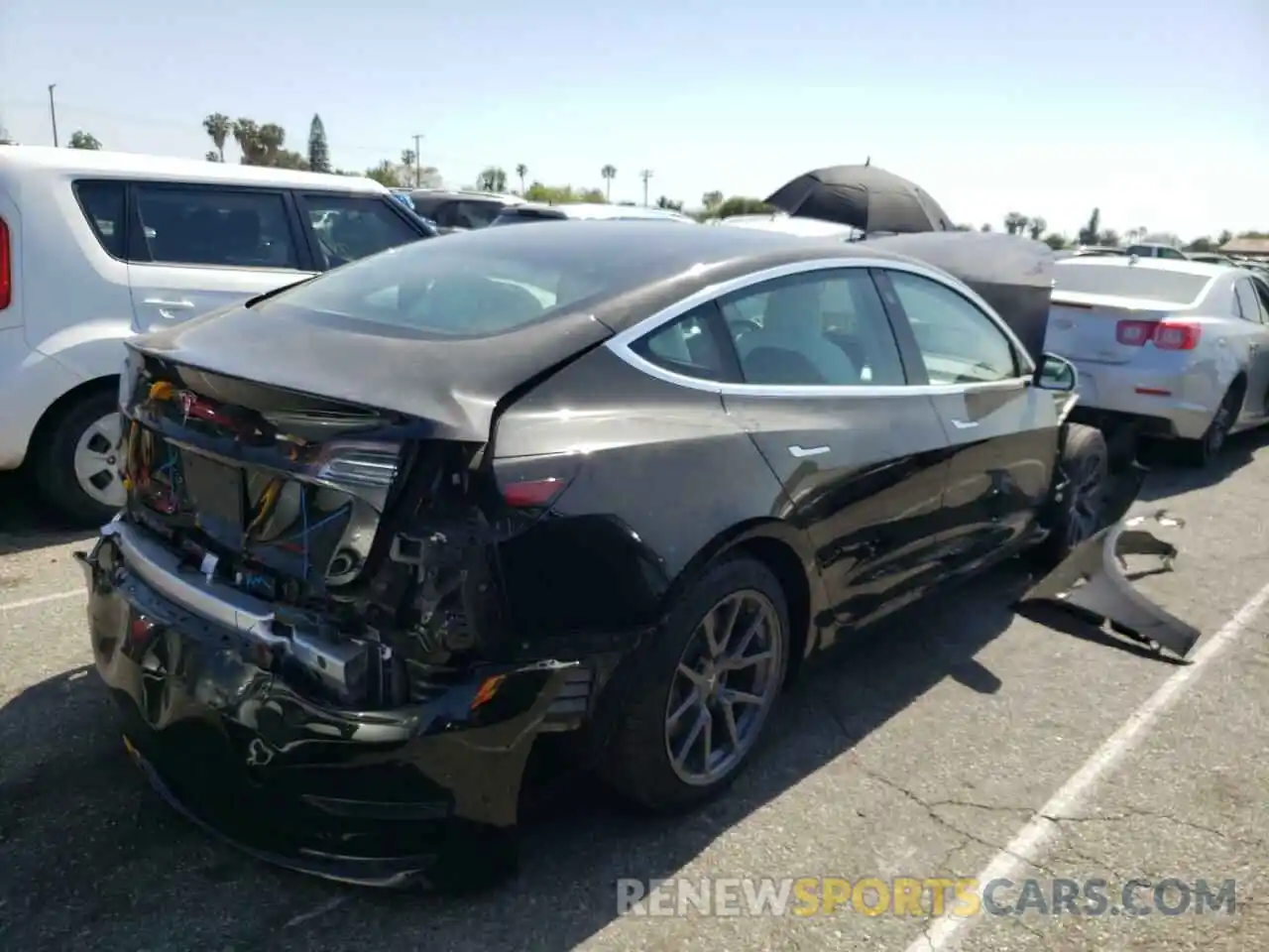 4 Photograph of a damaged car 5YJ3E1EA6LF738106 TESLA MODEL 3 2020