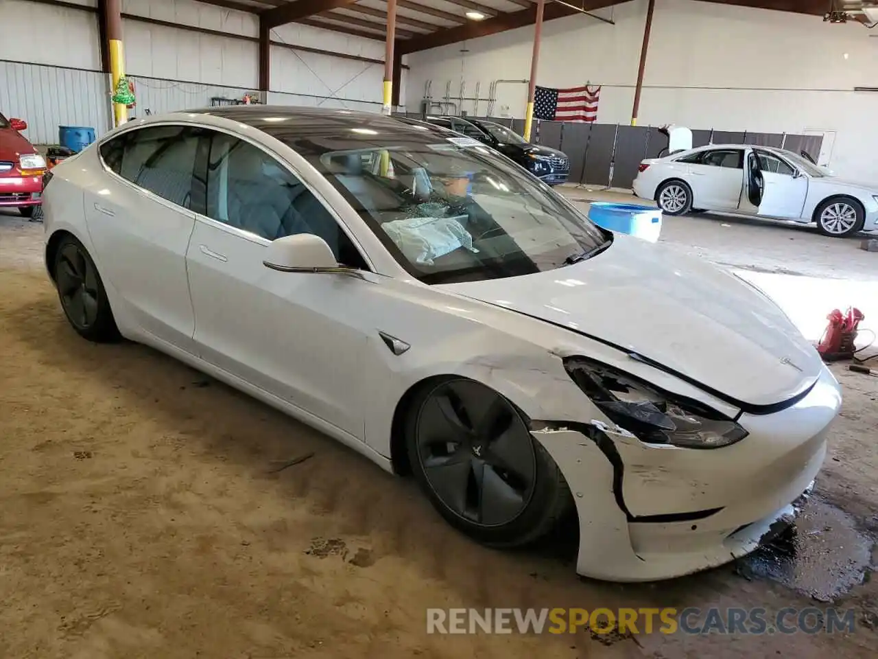 4 Photograph of a damaged car 5YJ3E1EA6LF742978 TESLA MODEL 3 2020