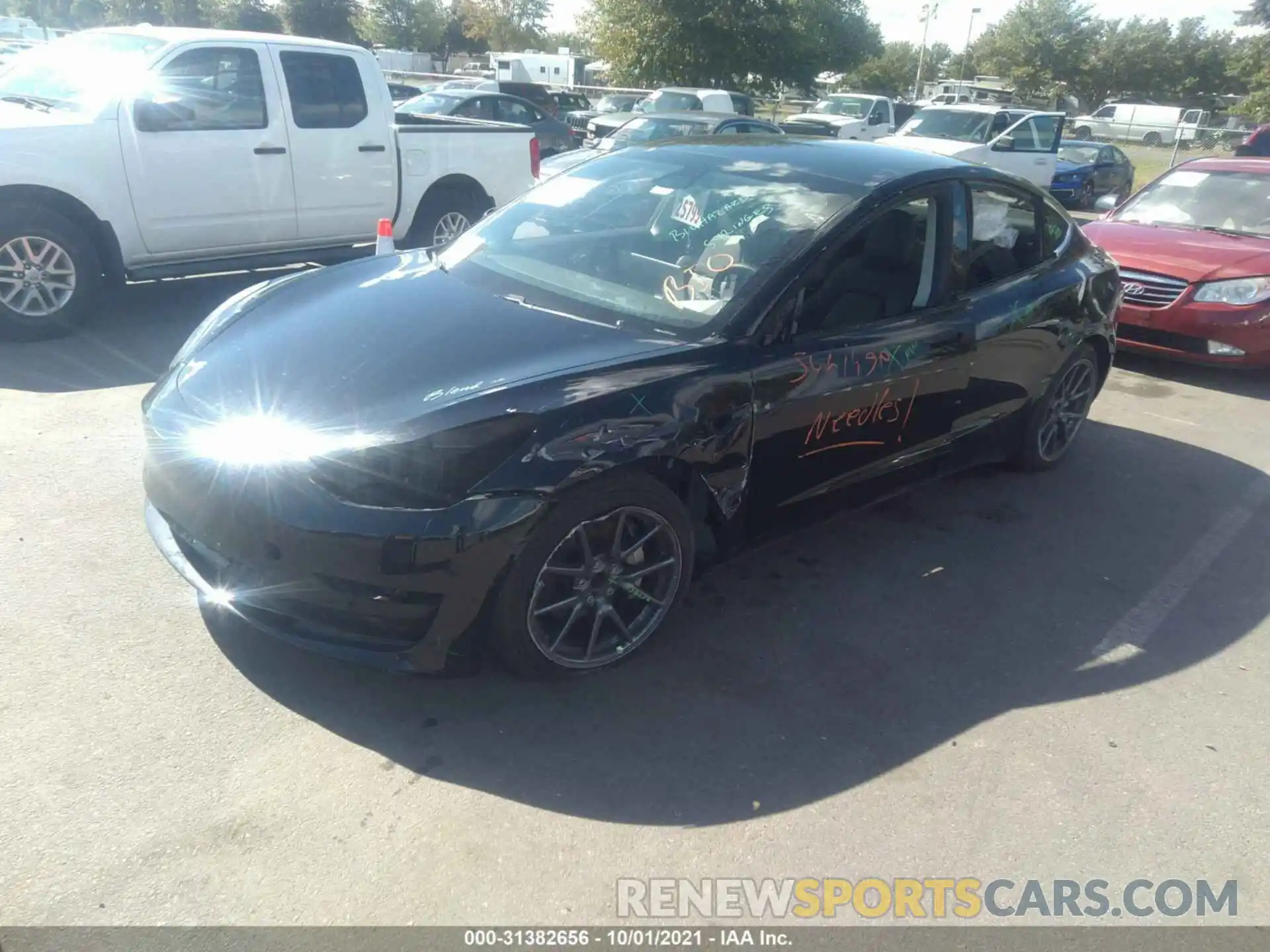 2 Photograph of a damaged car 5YJ3E1EA6LF745492 TESLA MODEL 3 2020