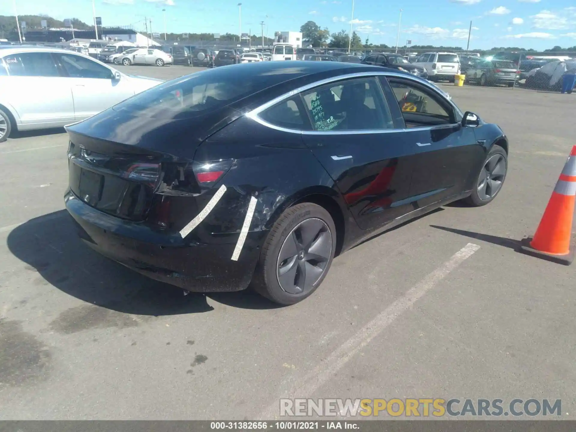 4 Photograph of a damaged car 5YJ3E1EA6LF745492 TESLA MODEL 3 2020