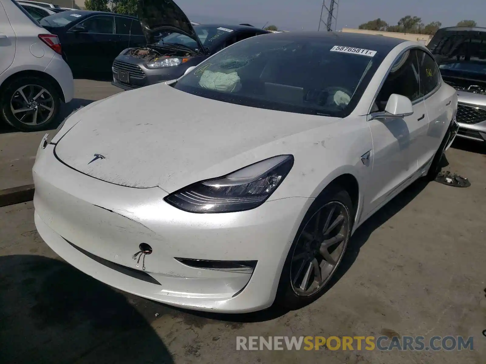 2 Photograph of a damaged car 5YJ3E1EA6LF747064 TESLA MODEL 3 2020