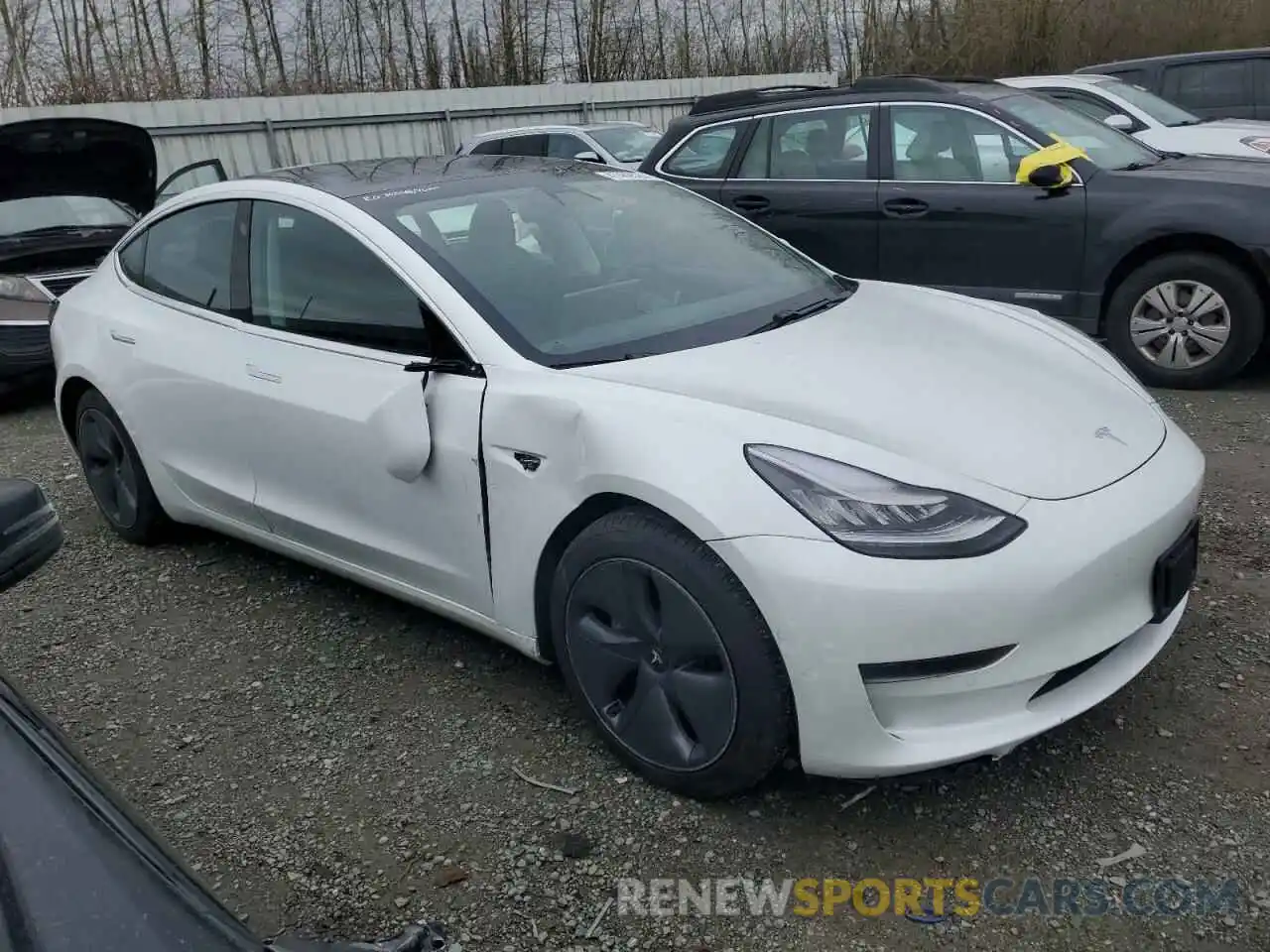 4 Photograph of a damaged car 5YJ3E1EA6LF786379 TESLA MODEL 3 2020