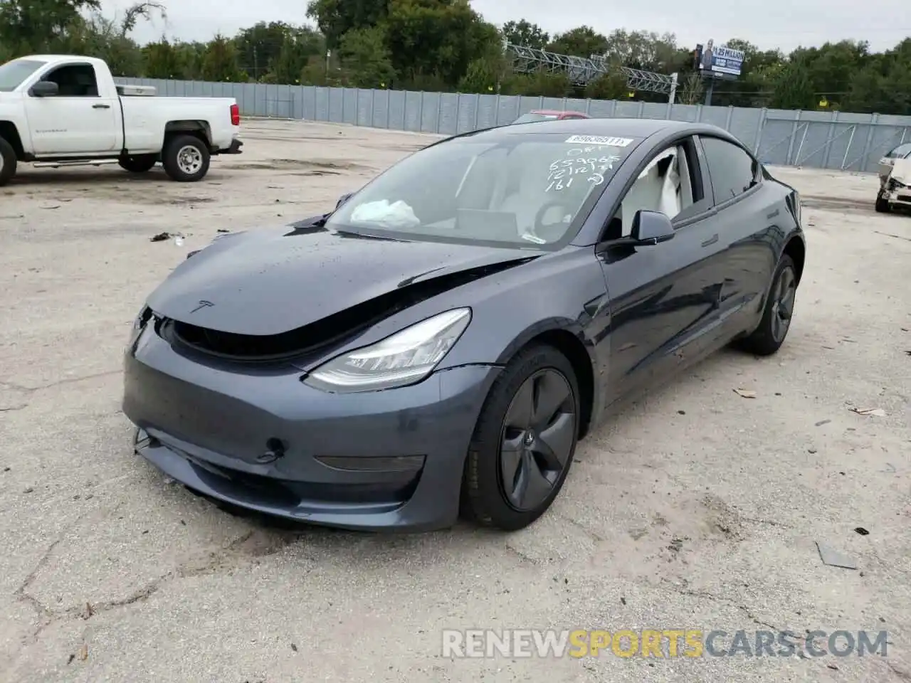 2 Photograph of a damaged car 5YJ3E1EA6LF793168 TESLA MODEL 3 2020