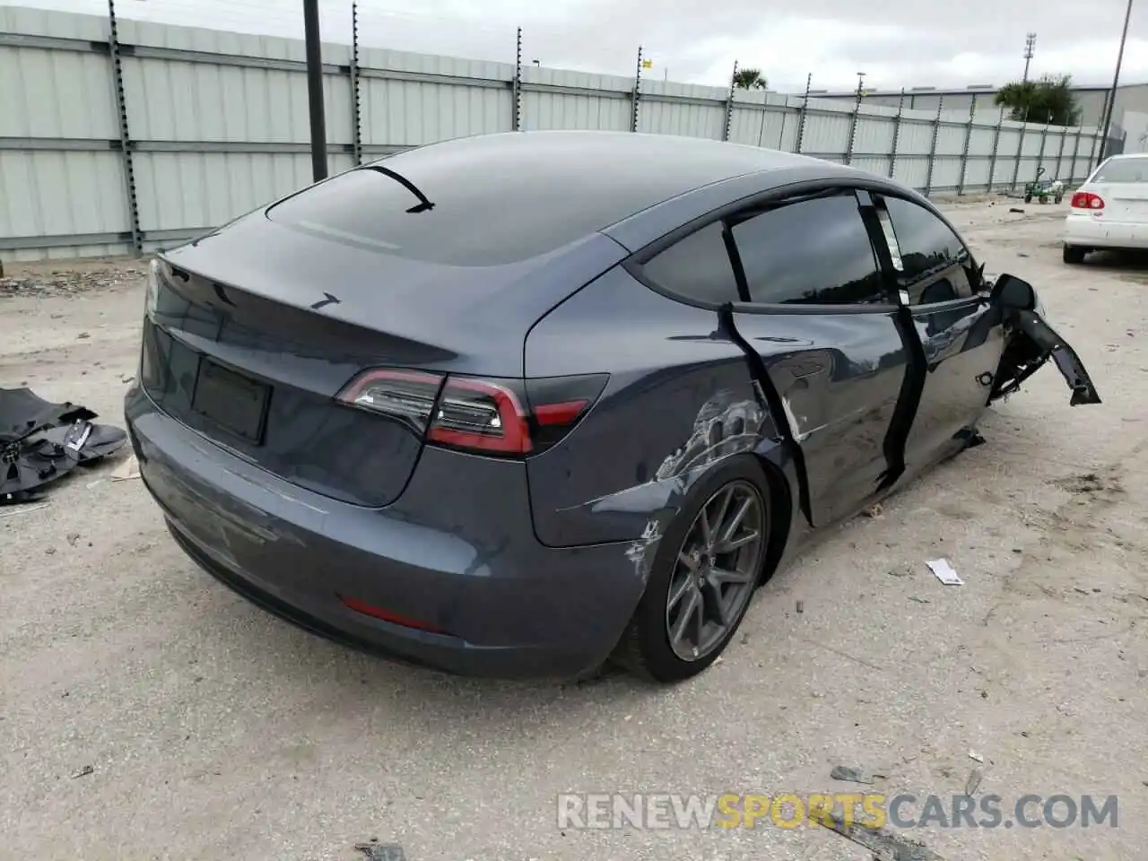 4 Photograph of a damaged car 5YJ3E1EA6LF793168 TESLA MODEL 3 2020