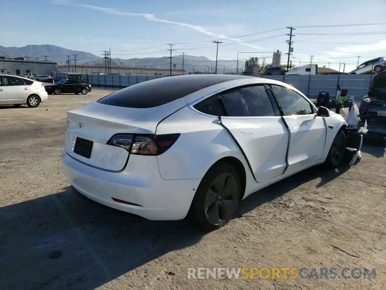 4 Photograph of a damaged car 5YJ3E1EA6LF803827 TESLA MODEL 3 2020