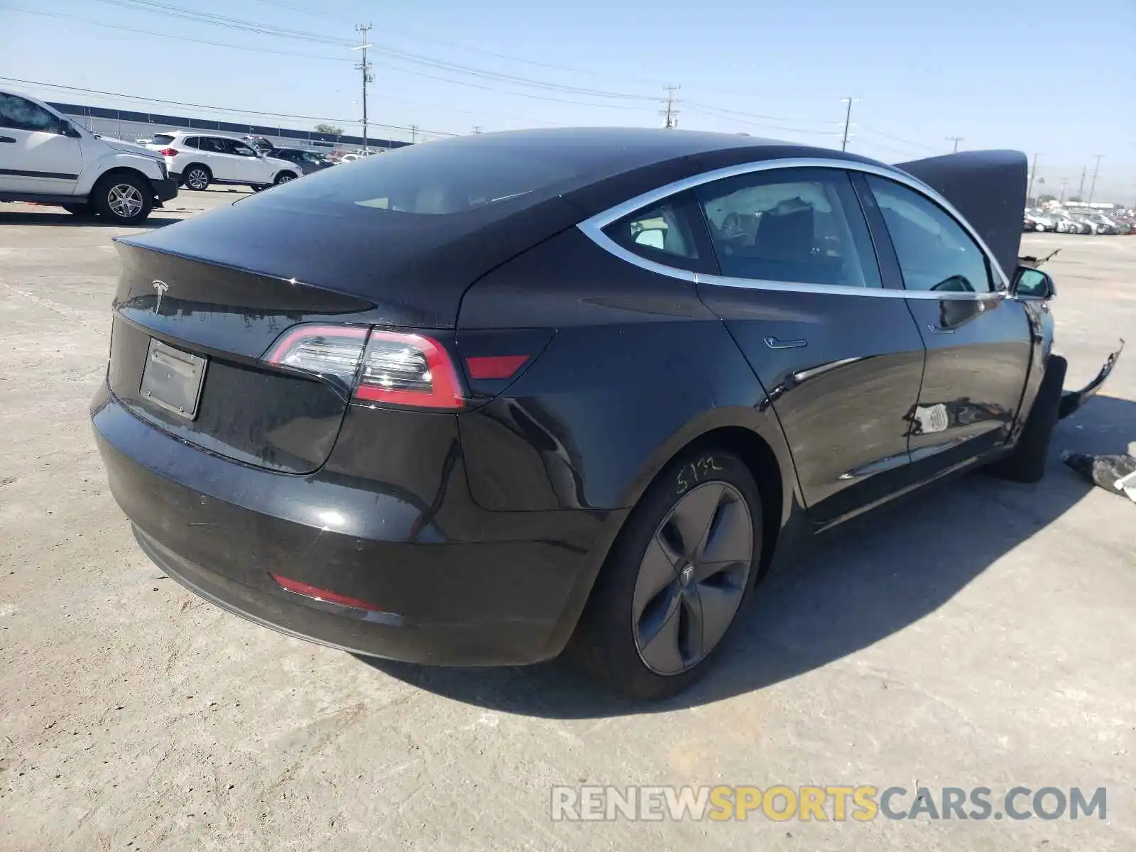 4 Photograph of a damaged car 5YJ3E1EA6LF808459 TESLA MODEL 3 2020