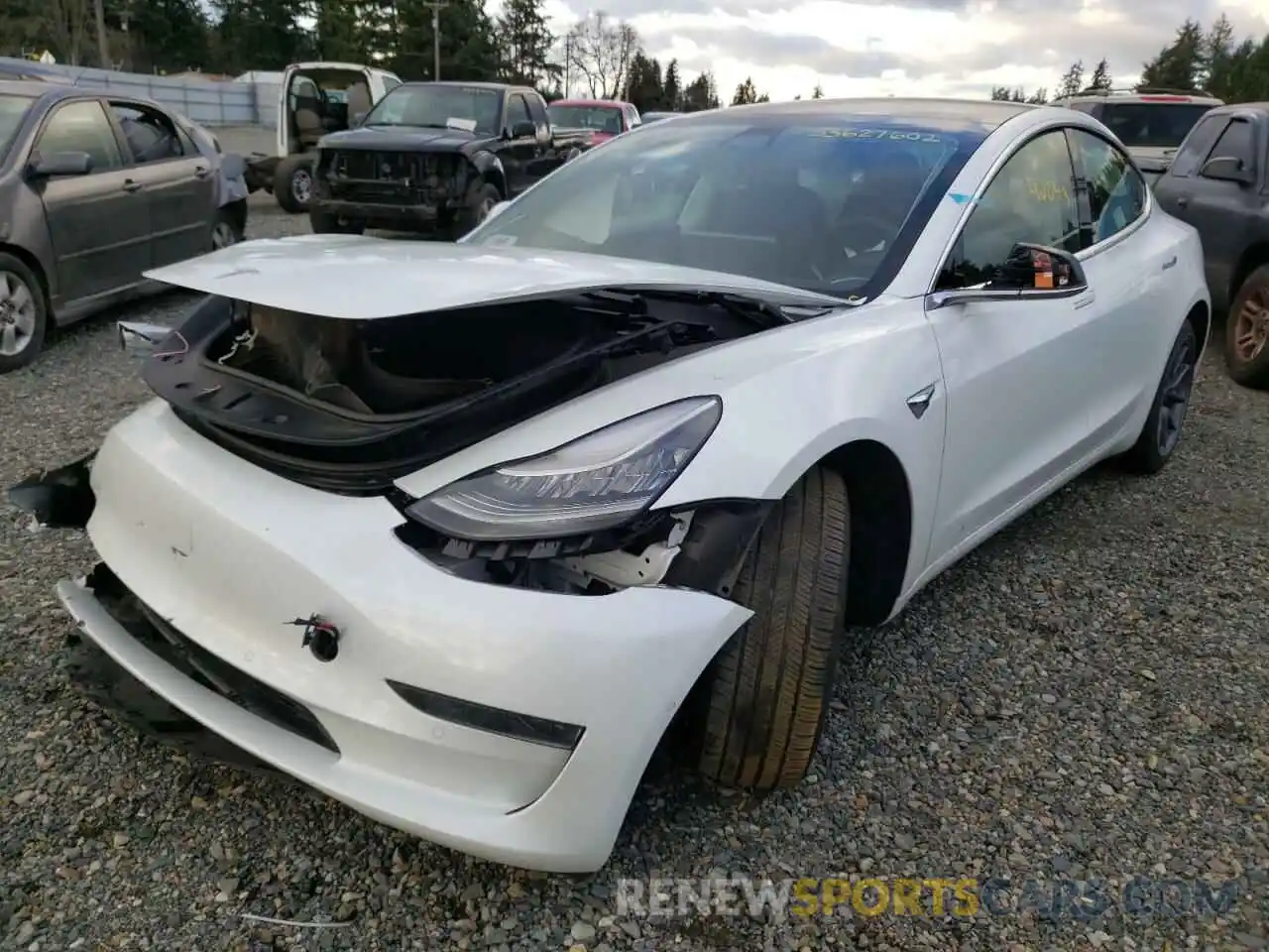 2 Photograph of a damaged car 5YJ3E1EA7LF504797 TESLA MODEL 3 2020