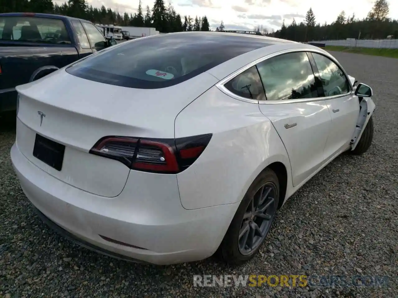 4 Photograph of a damaged car 5YJ3E1EA7LF504797 TESLA MODEL 3 2020