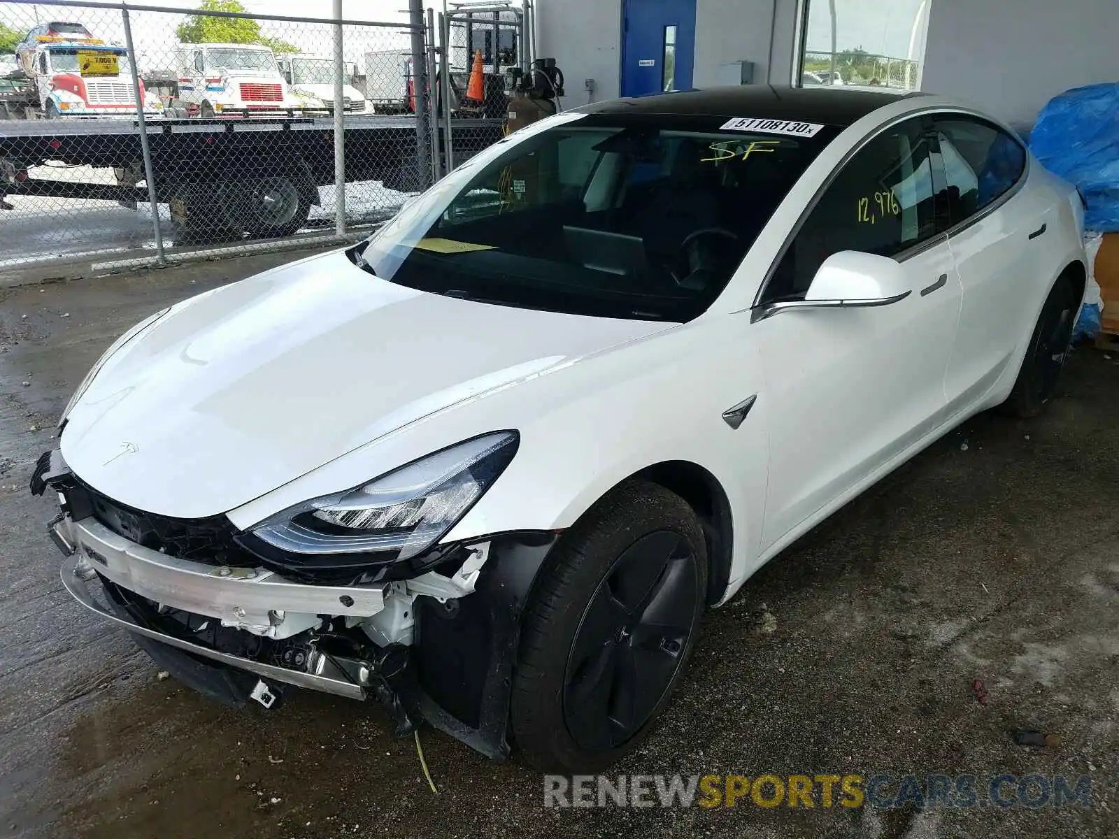 2 Photograph of a damaged car 5YJ3E1EA7LF597644 TESLA MODEL 3 2020