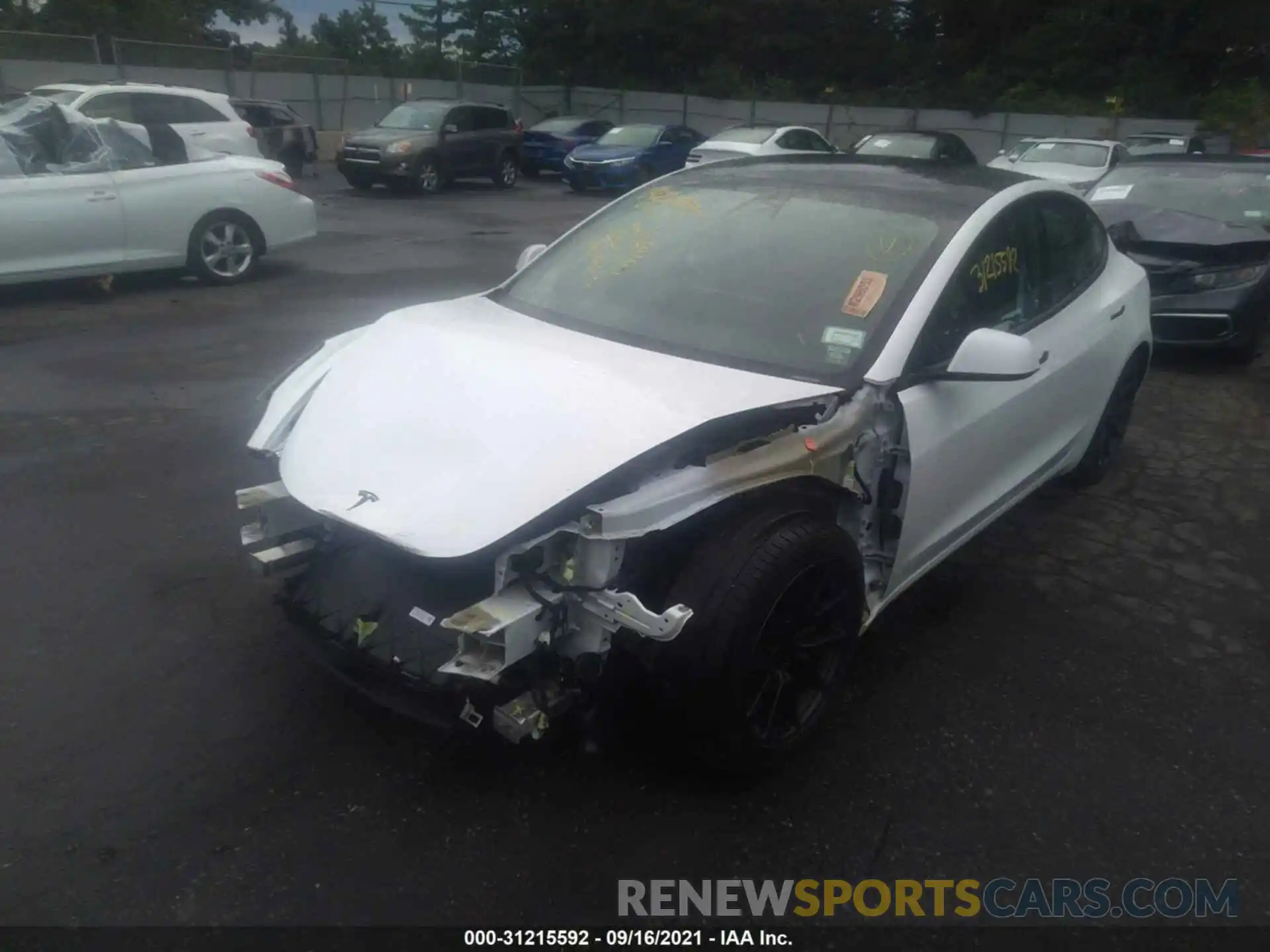 2 Photograph of a damaged car 5YJ3E1EA7LF612997 TESLA MODEL 3 2020