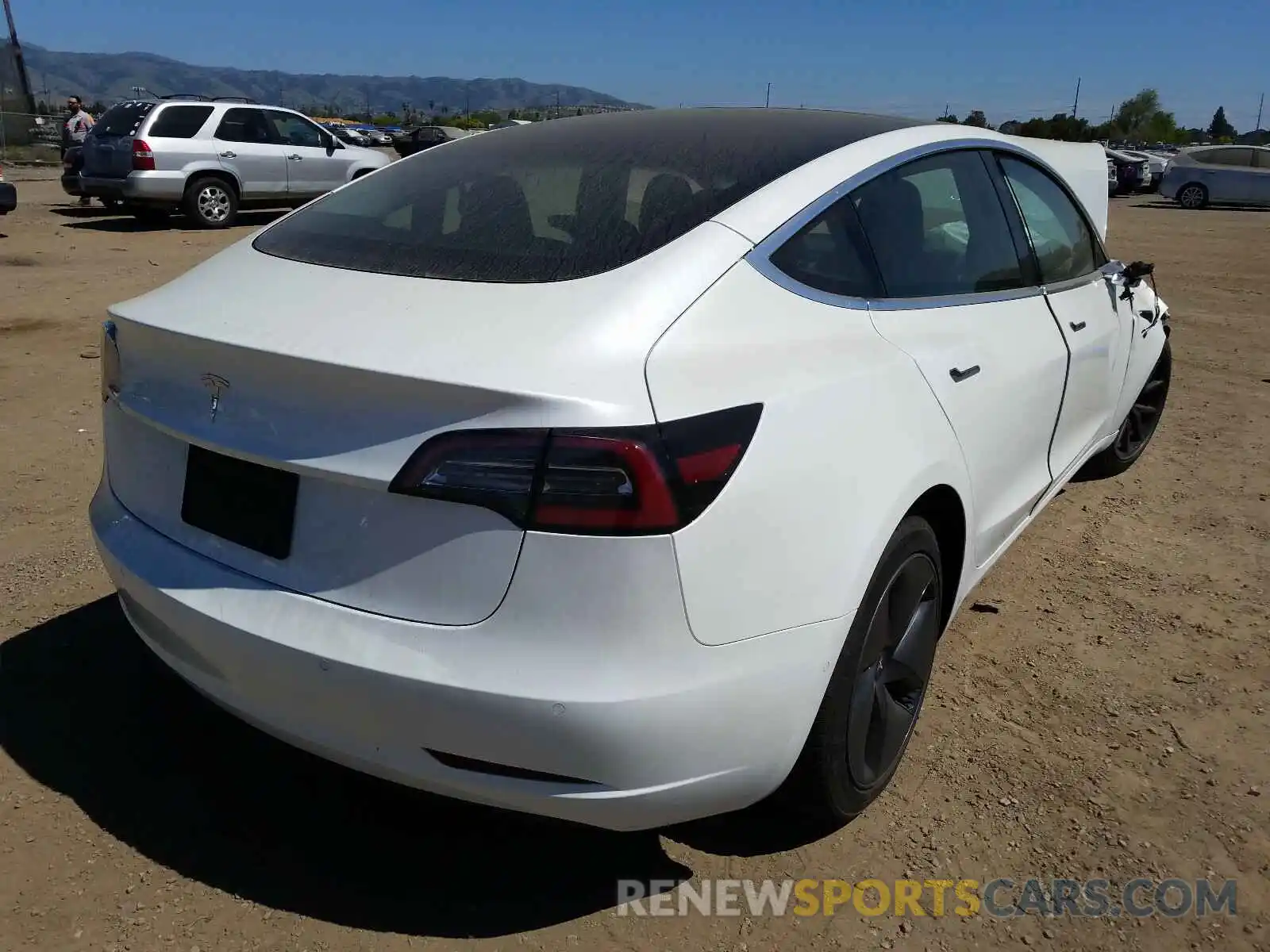 4 Photograph of a damaged car 5YJ3E1EA7LF631792 TESLA MODEL 3 2020