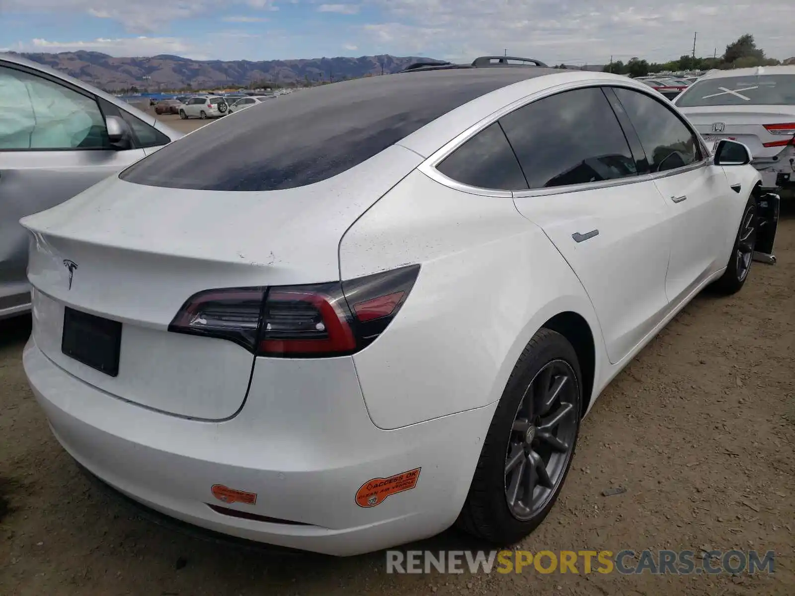 4 Photograph of a damaged car 5YJ3E1EA7LF633459 TESLA MODEL 3 2020