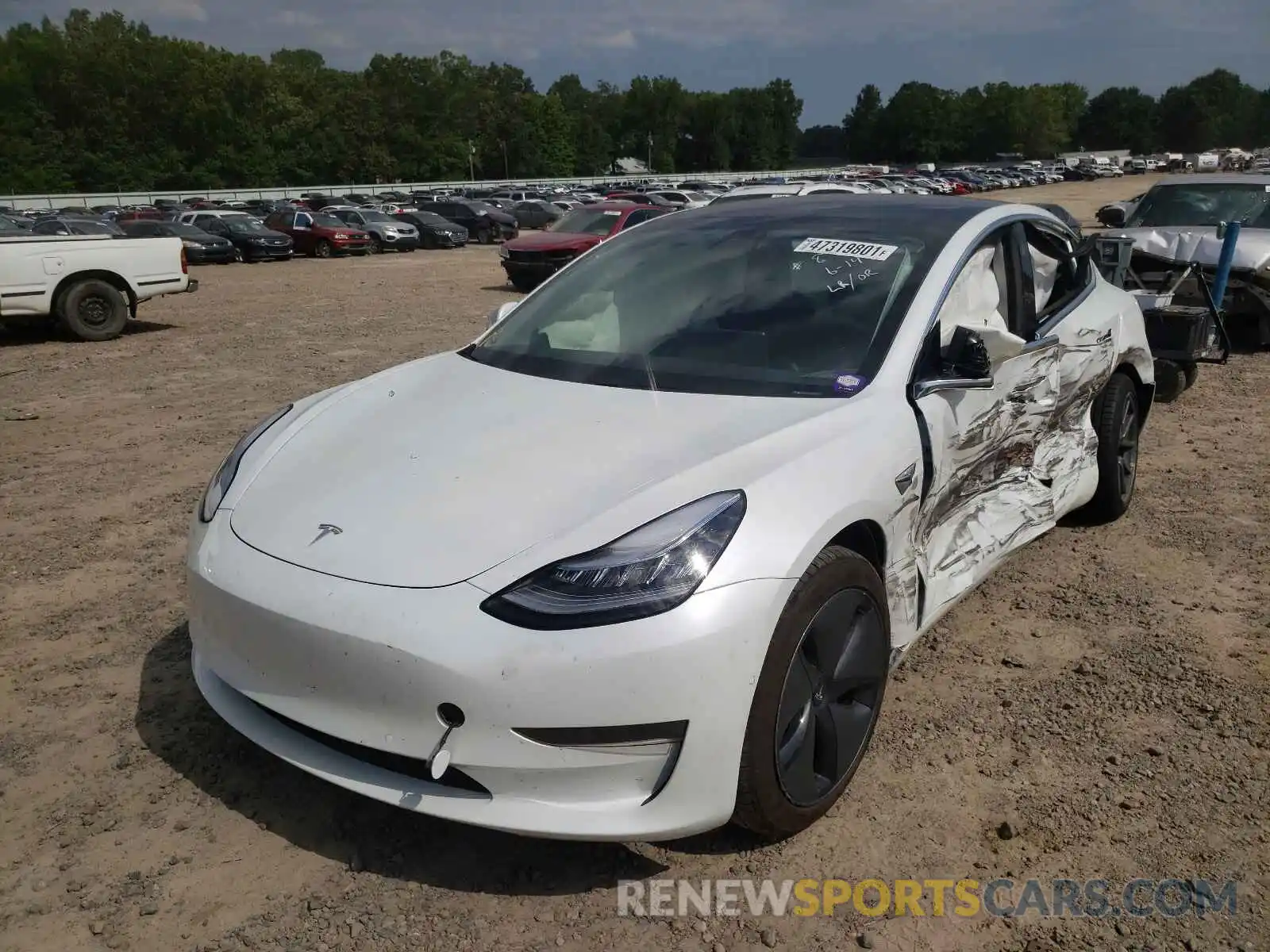 2 Photograph of a damaged car 5YJ3E1EA7LF659043 TESLA MODEL 3 2020