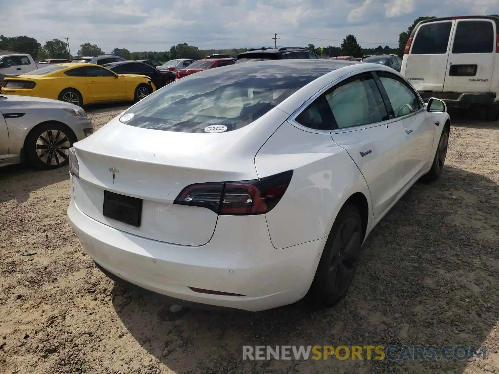 4 Photograph of a damaged car 5YJ3E1EA7LF659043 TESLA MODEL 3 2020