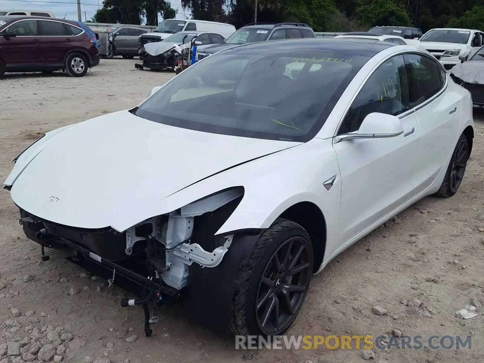 2 Photograph of a damaged car 5YJ3E1EA7LF659169 TESLA MODEL 3 2020