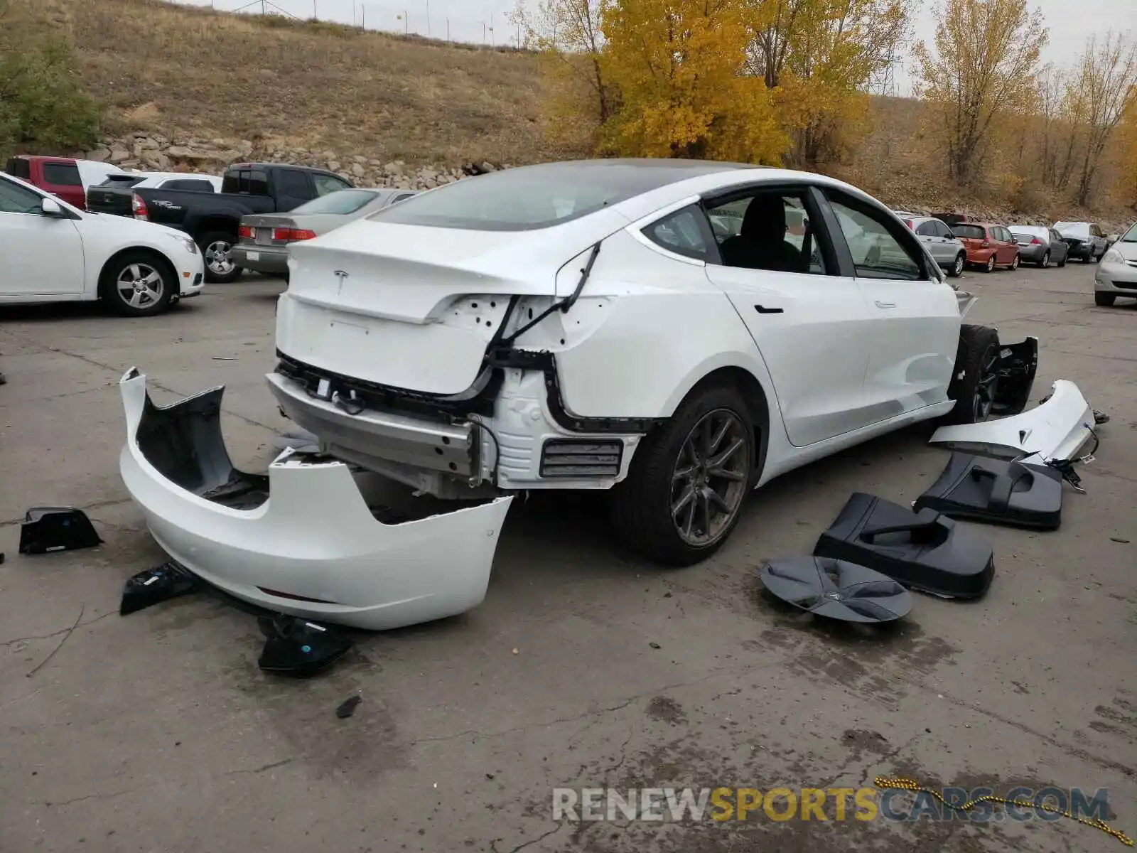 4 Photograph of a damaged car 5YJ3E1EA7LF659754 TESLA MODEL 3 2020