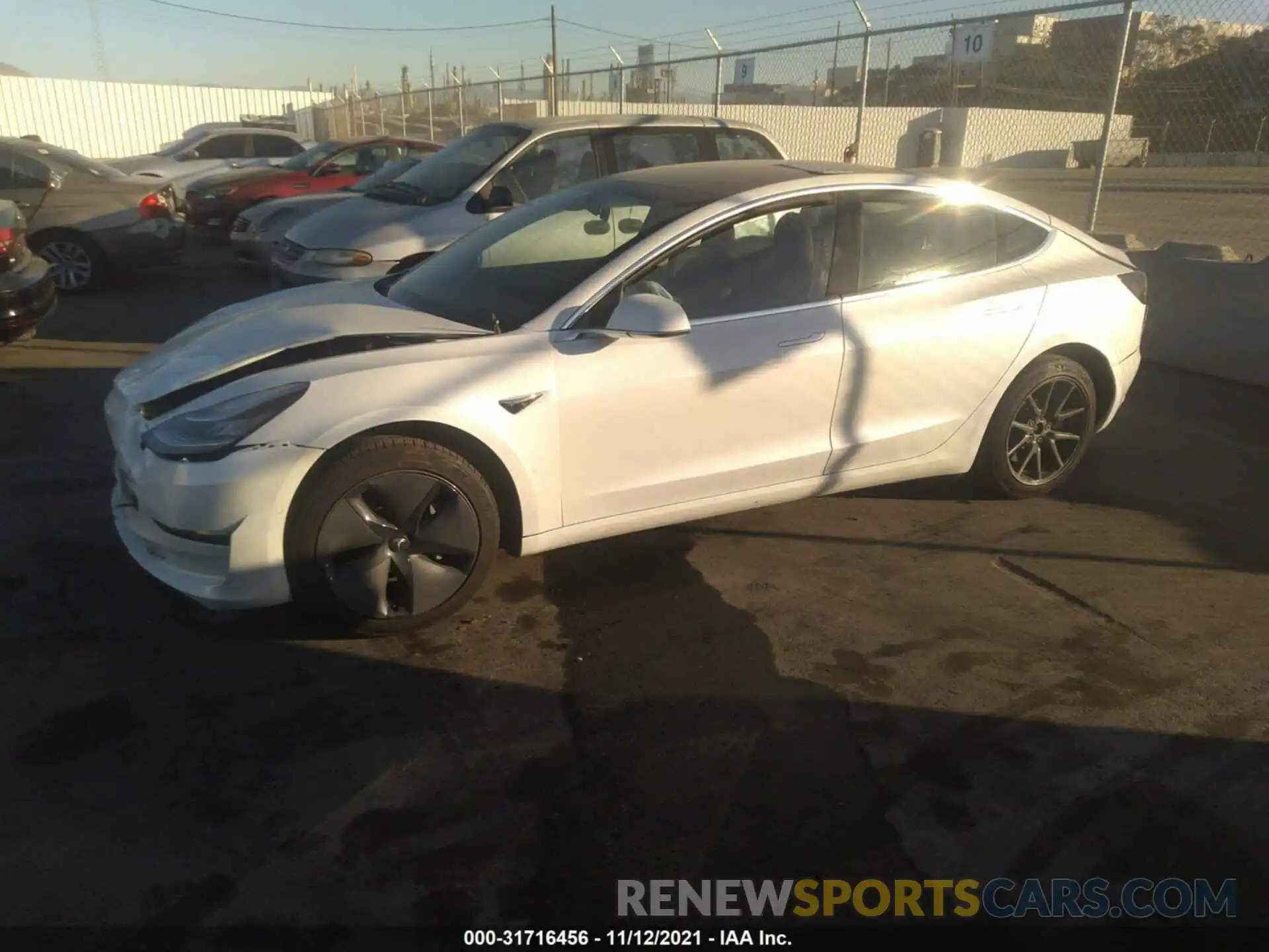 2 Photograph of a damaged car 5YJ3E1EA7LF660273 TESLA MODEL 3 2020