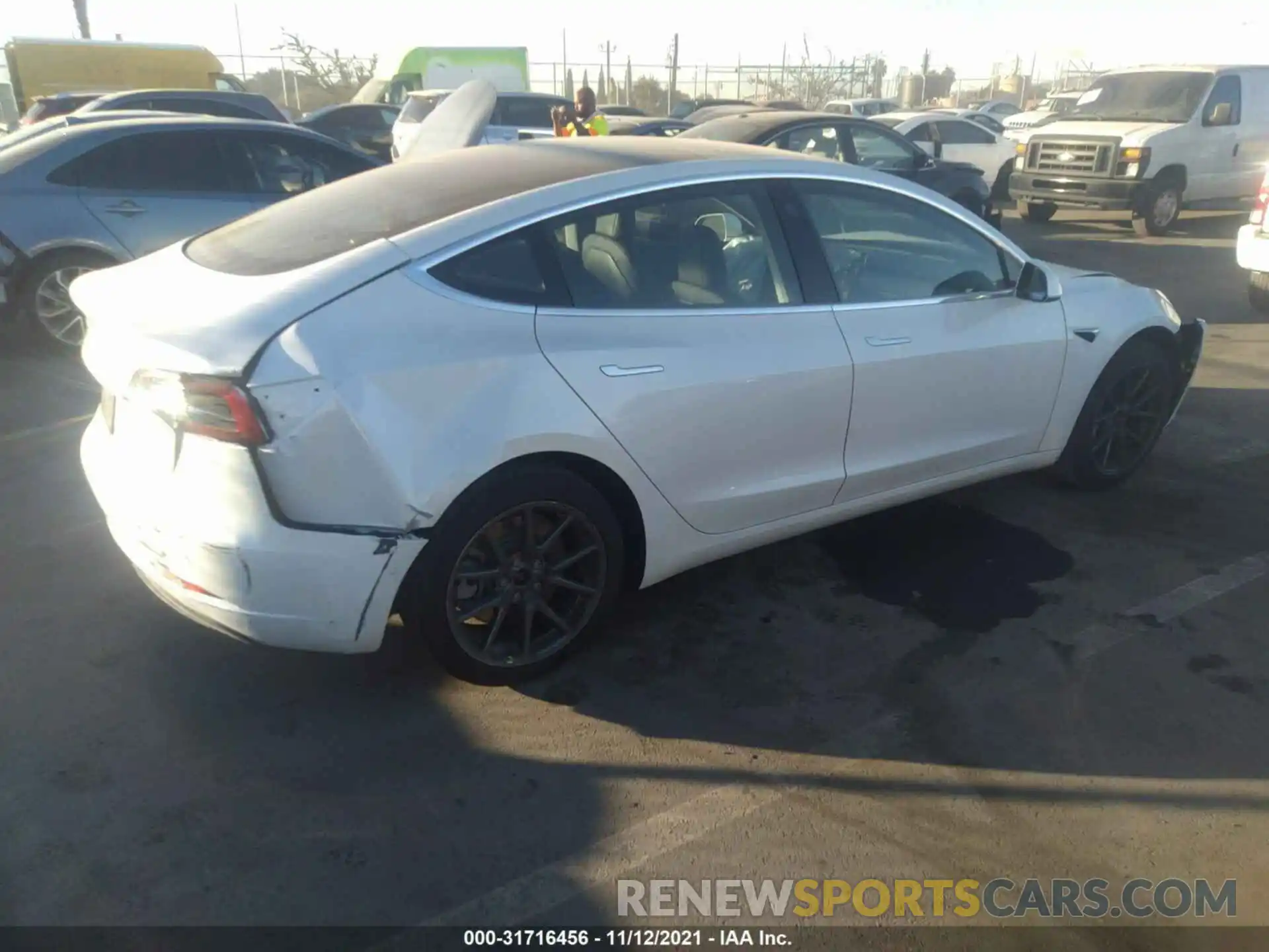 4 Photograph of a damaged car 5YJ3E1EA7LF660273 TESLA MODEL 3 2020